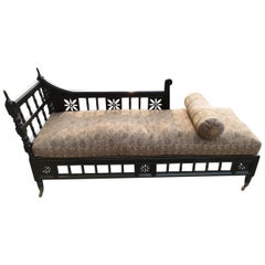 Antique In the Style of E W Godwin, An Anglo-Japanese  Ebonized Chaise Lounge or Day Bed