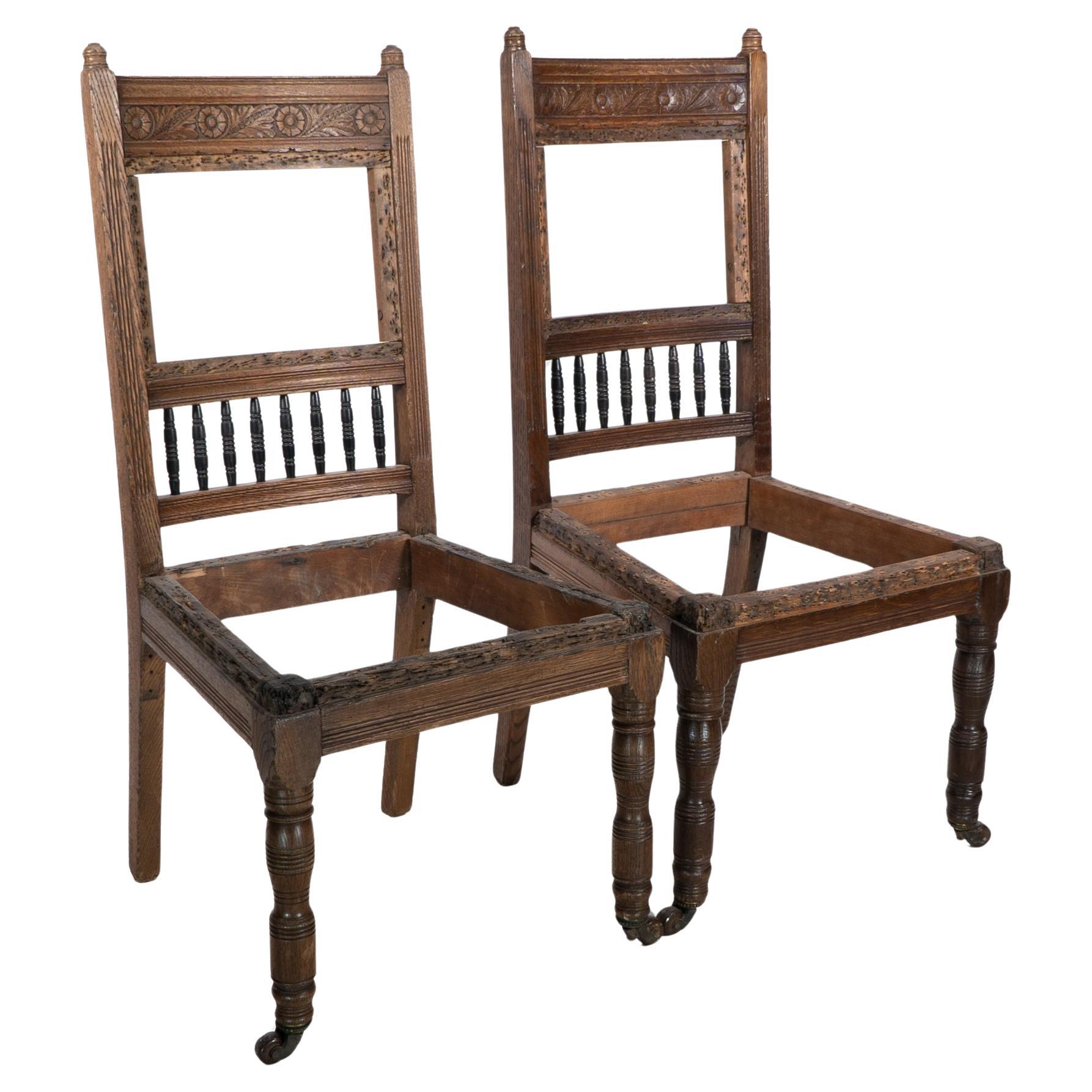 E W Godwin attr. A pair of Aesthetic Movement oak dining chairs ready upholstery For Sale