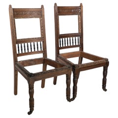 Antique E W Godwin attr. A pair of Aesthetic Movement oak dining chairs ready upholstery