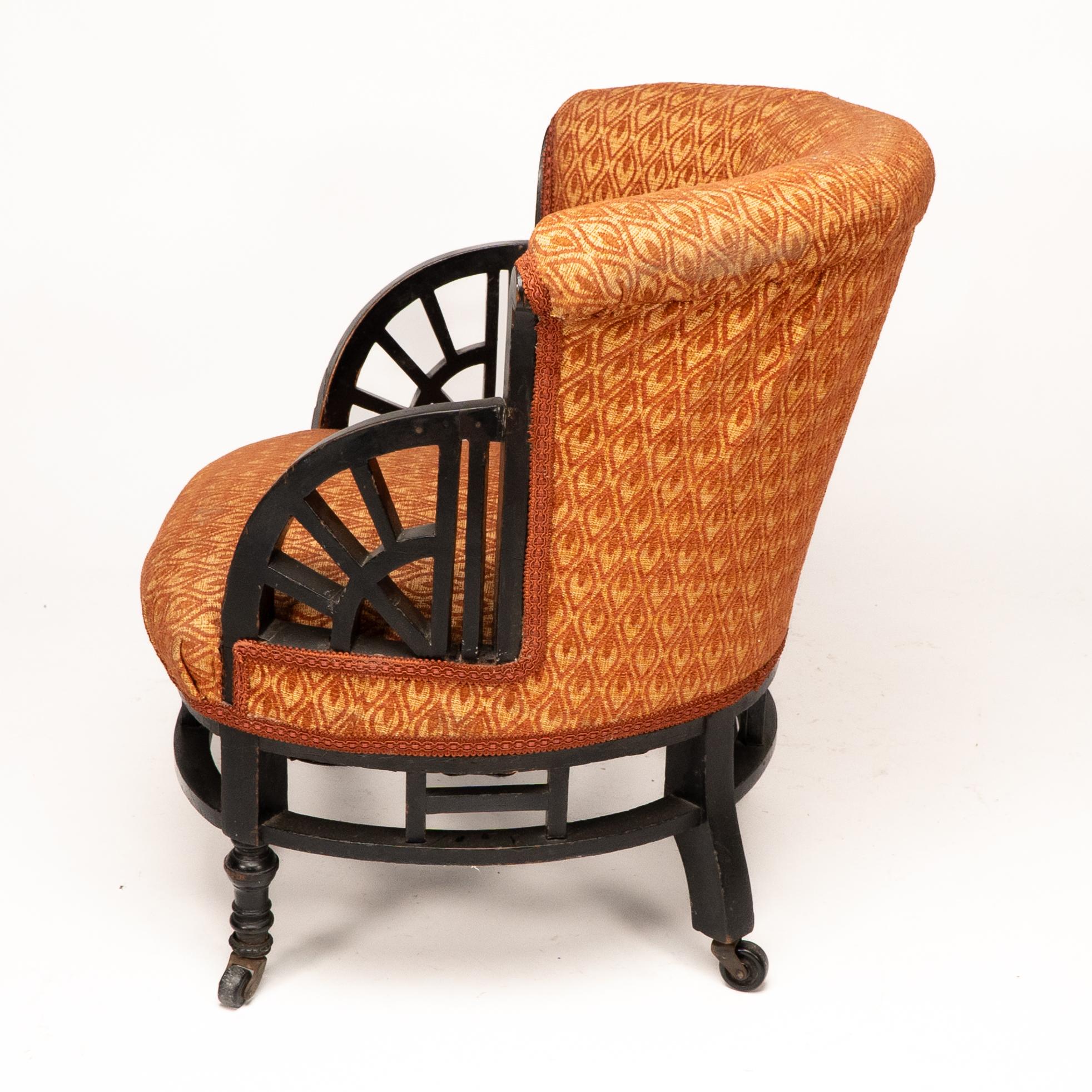Late 19th Century E W Godwin attri. An Anglo-Japanese circular armchair with fan shaped arms For Sale
