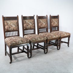E W Godwin attributed, A set of four Aesthetic Movement oak dining chairs