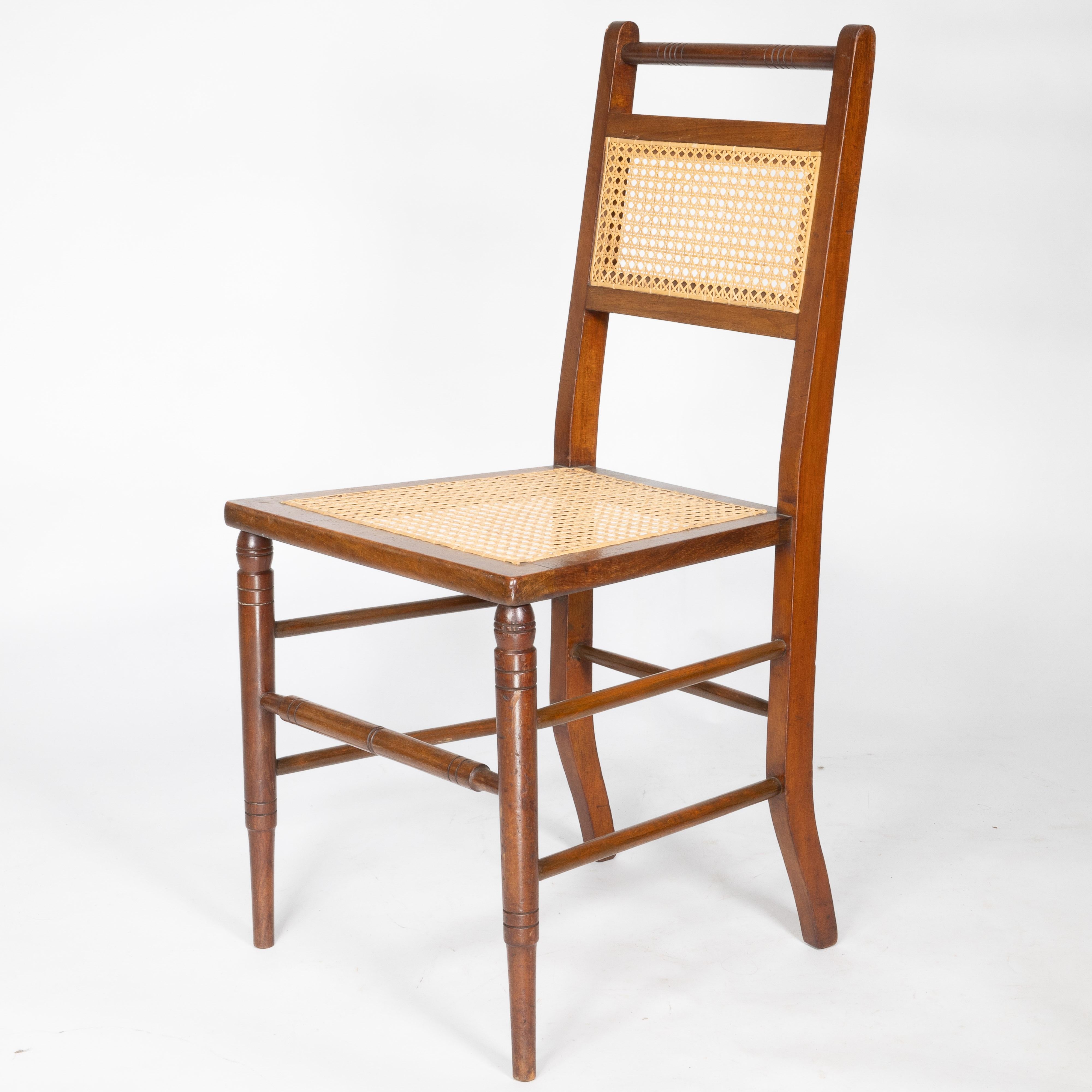 E W Godwin (attributed). A set of four Anglo-Japanese cane seat chairs For Sale 3