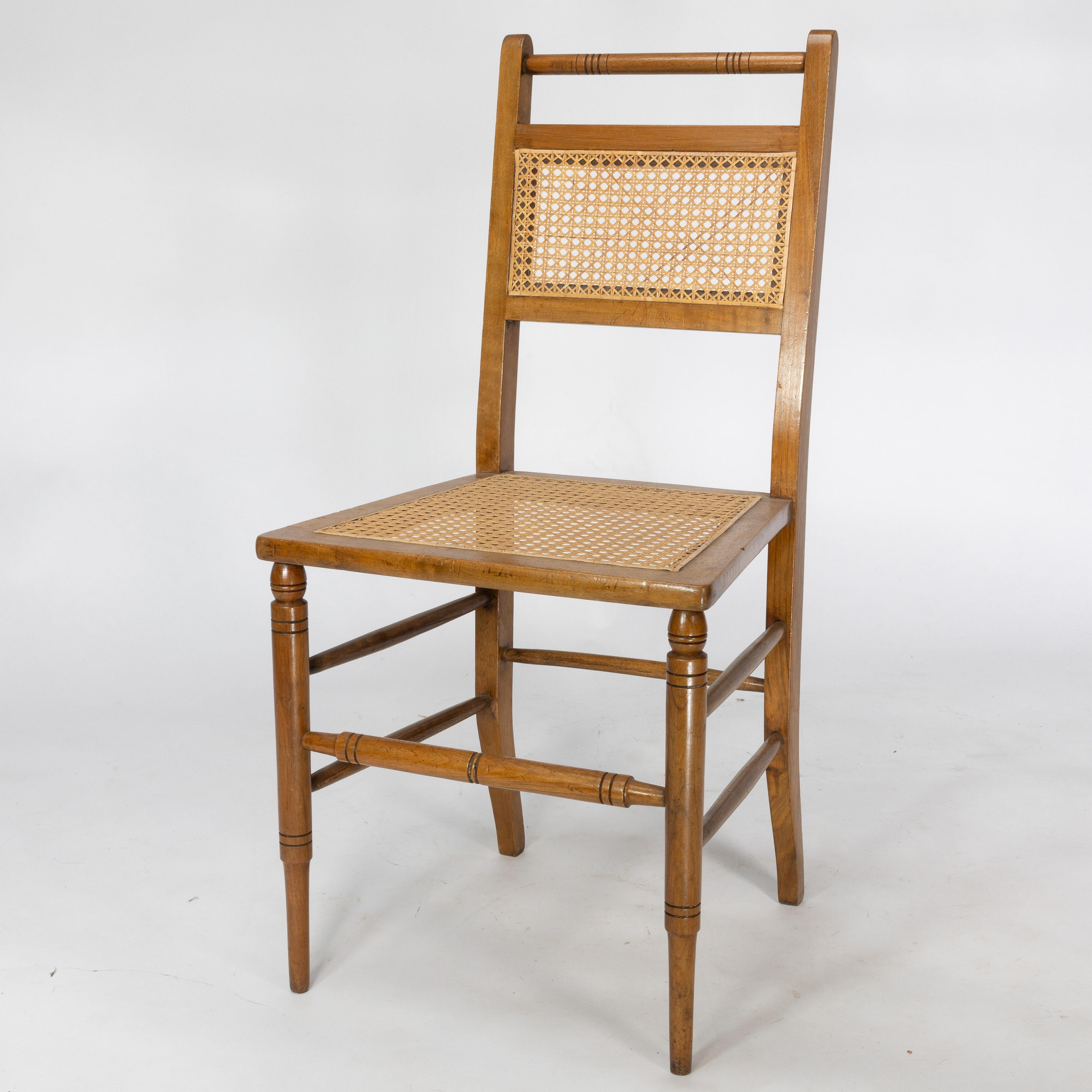 E W Godwin (attributed). A set of four Anglo-Japanese cane seat chairs In Good Condition For Sale In London, GB