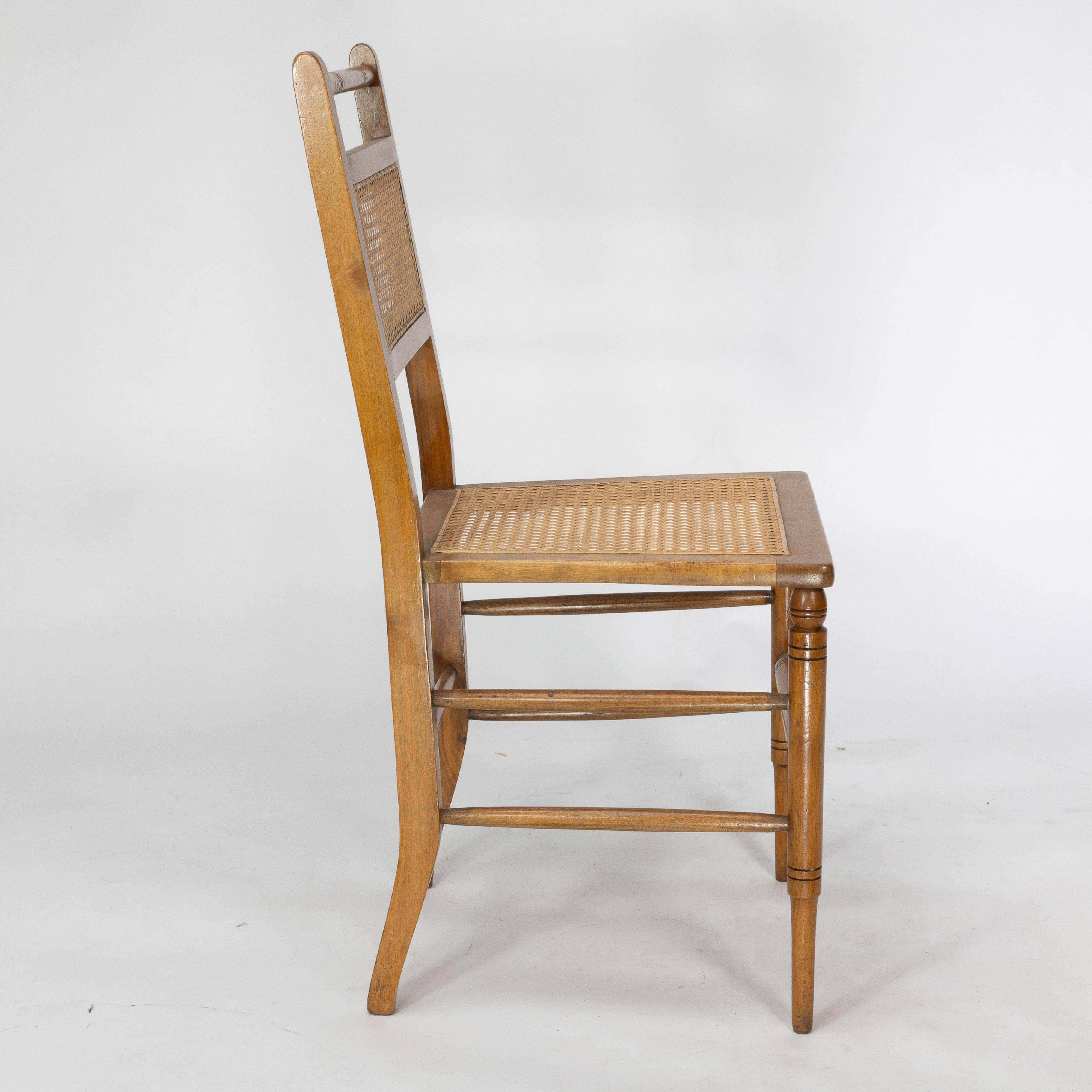 Cane E W Godwin (attributed). A set of four Anglo-Japanese cane seat chairs For Sale