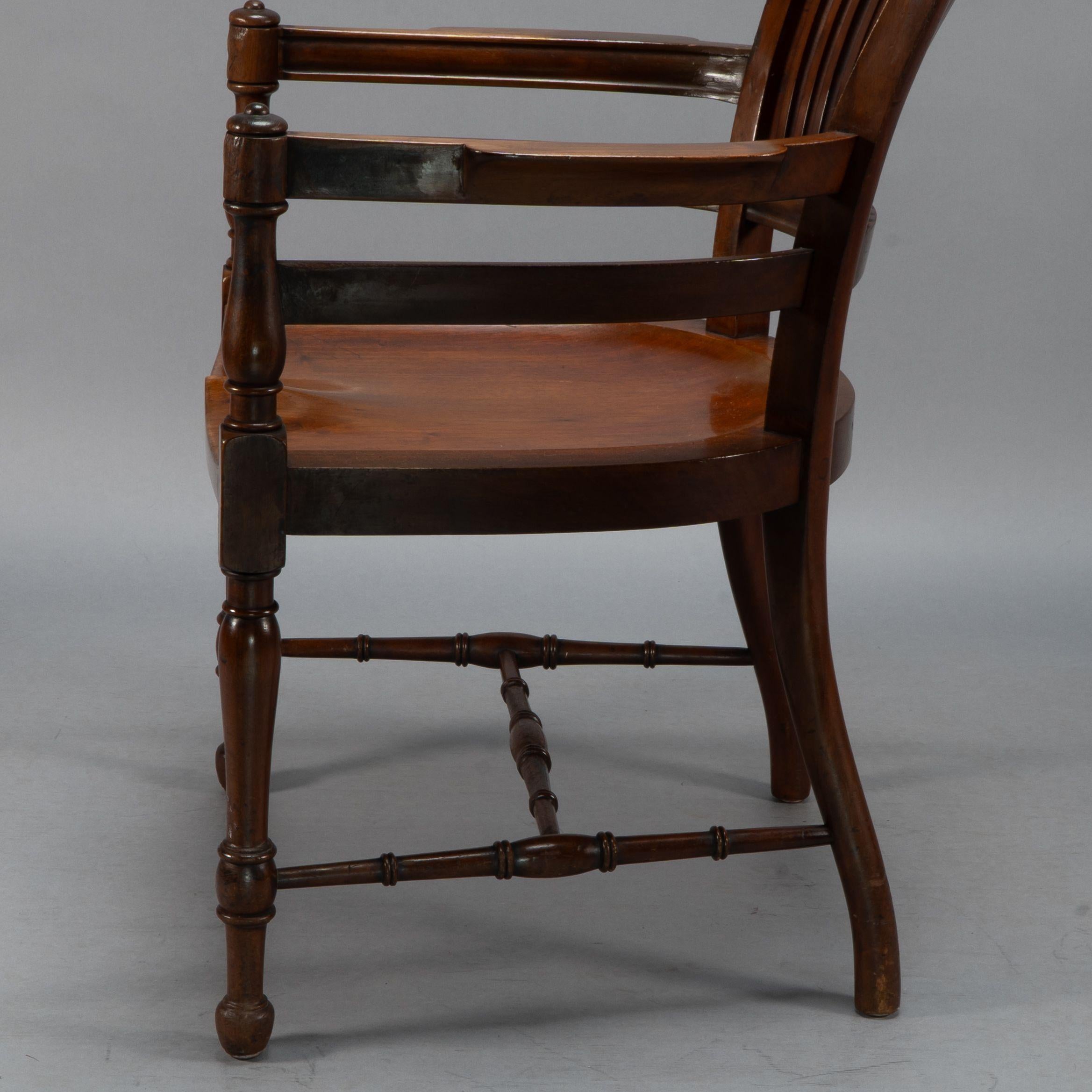 E. W. Godwin, Attributed. A tall back serpentine shape Walnut Armchair For Sale 6