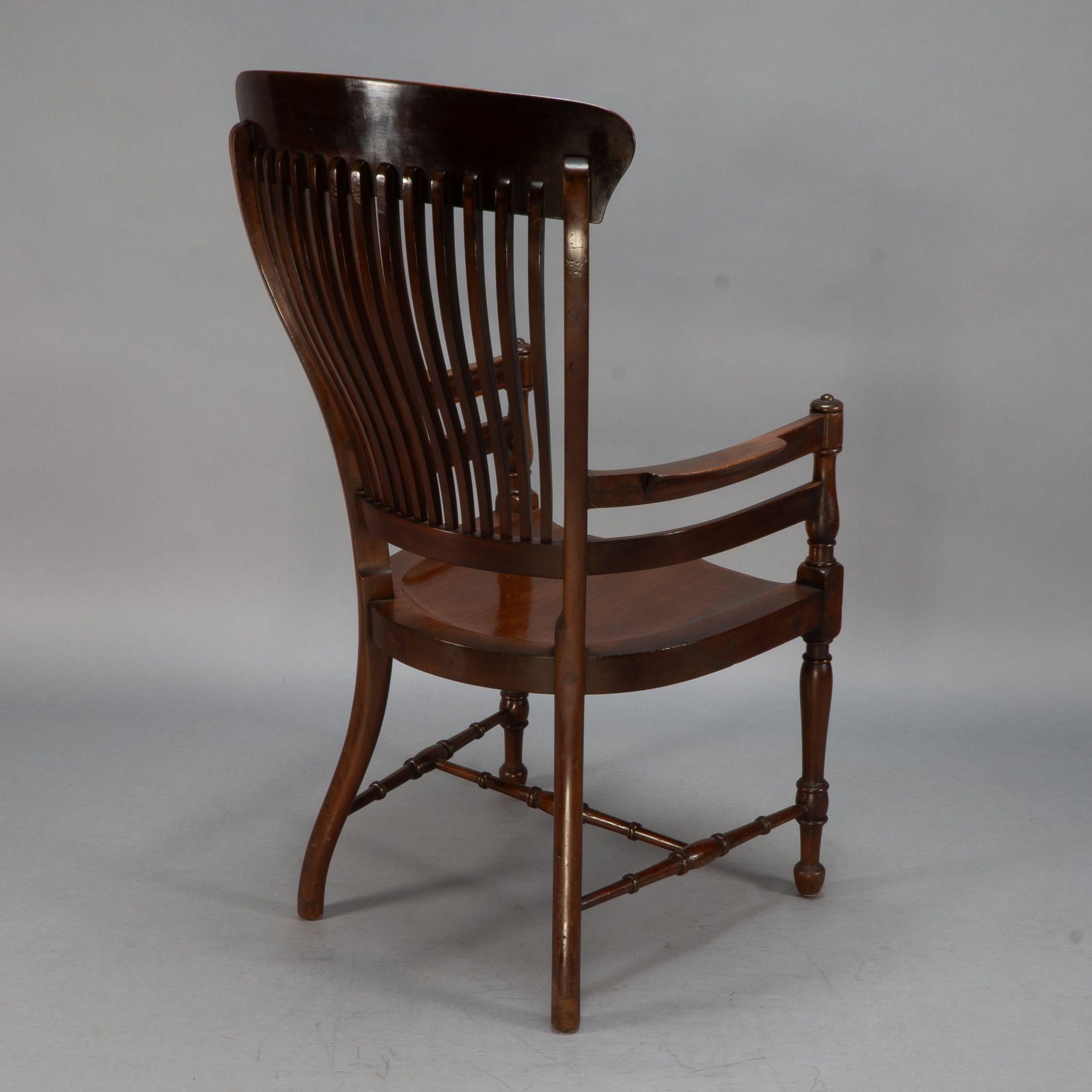 E. W. Godwin, Attributed. A tall back serpentine shape Walnut Armchair For Sale 12