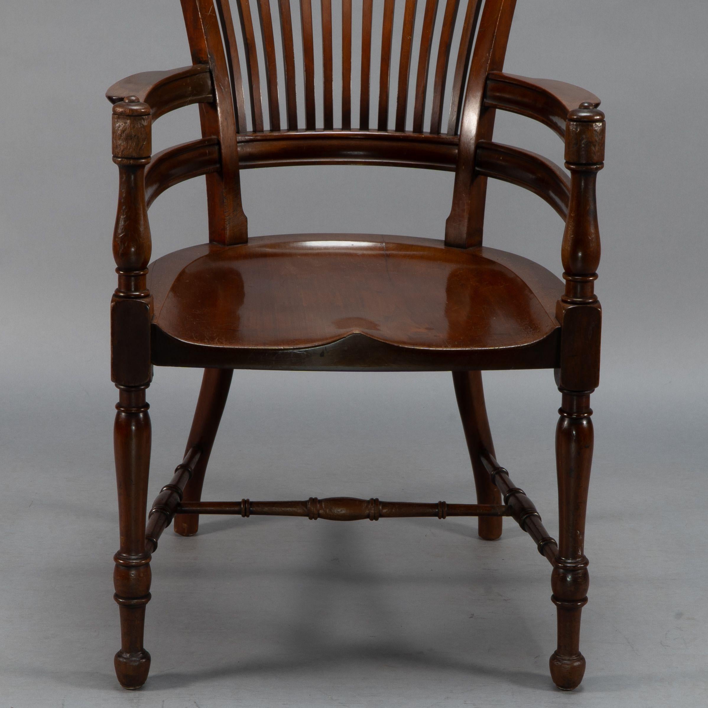 E. W. Godwin, Attributed. A tall back serpentine shape Walnut Armchair For Sale 4