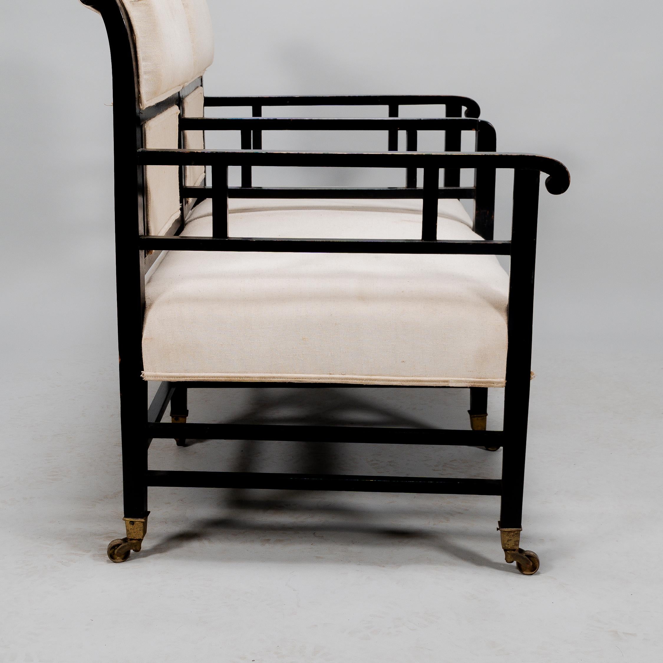 E W Godwin (attributed). An Anglo-Japanese ebonized duet or conversation settee. For Sale 5