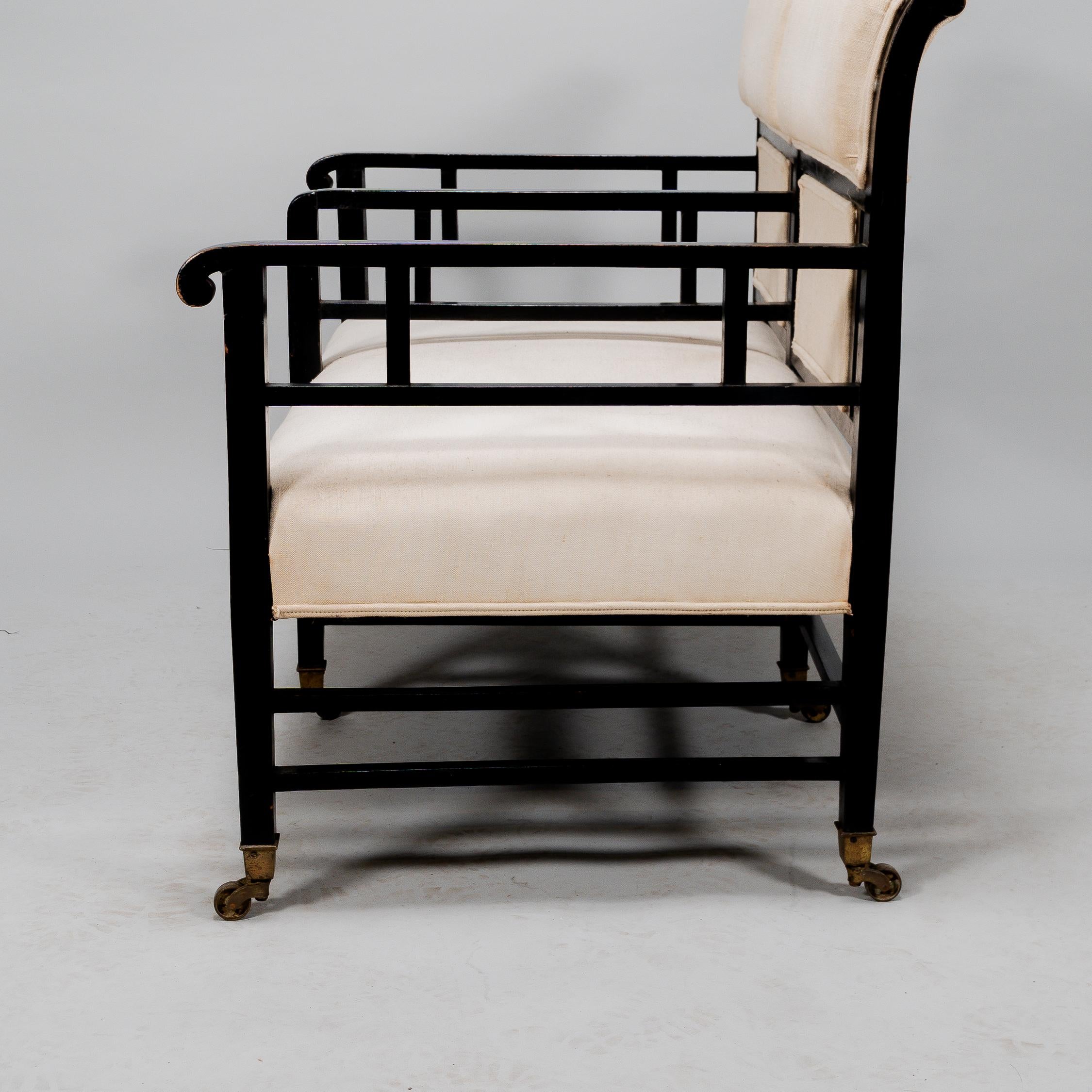 E W Godwin (attributed). An Anglo-Japanese ebonized duet or conversation settee. For Sale 10