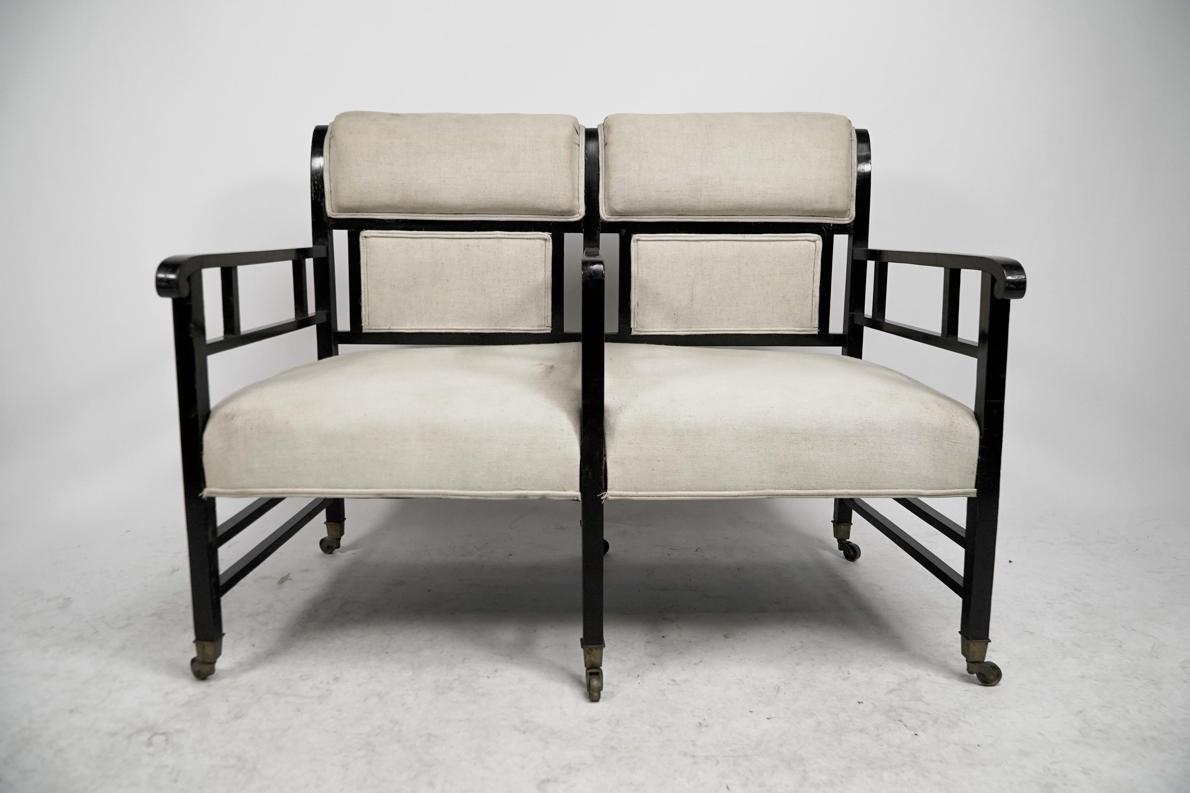 English E W Godwin (attributed). An Anglo-Japanese ebonized duet or conversation settee. For Sale