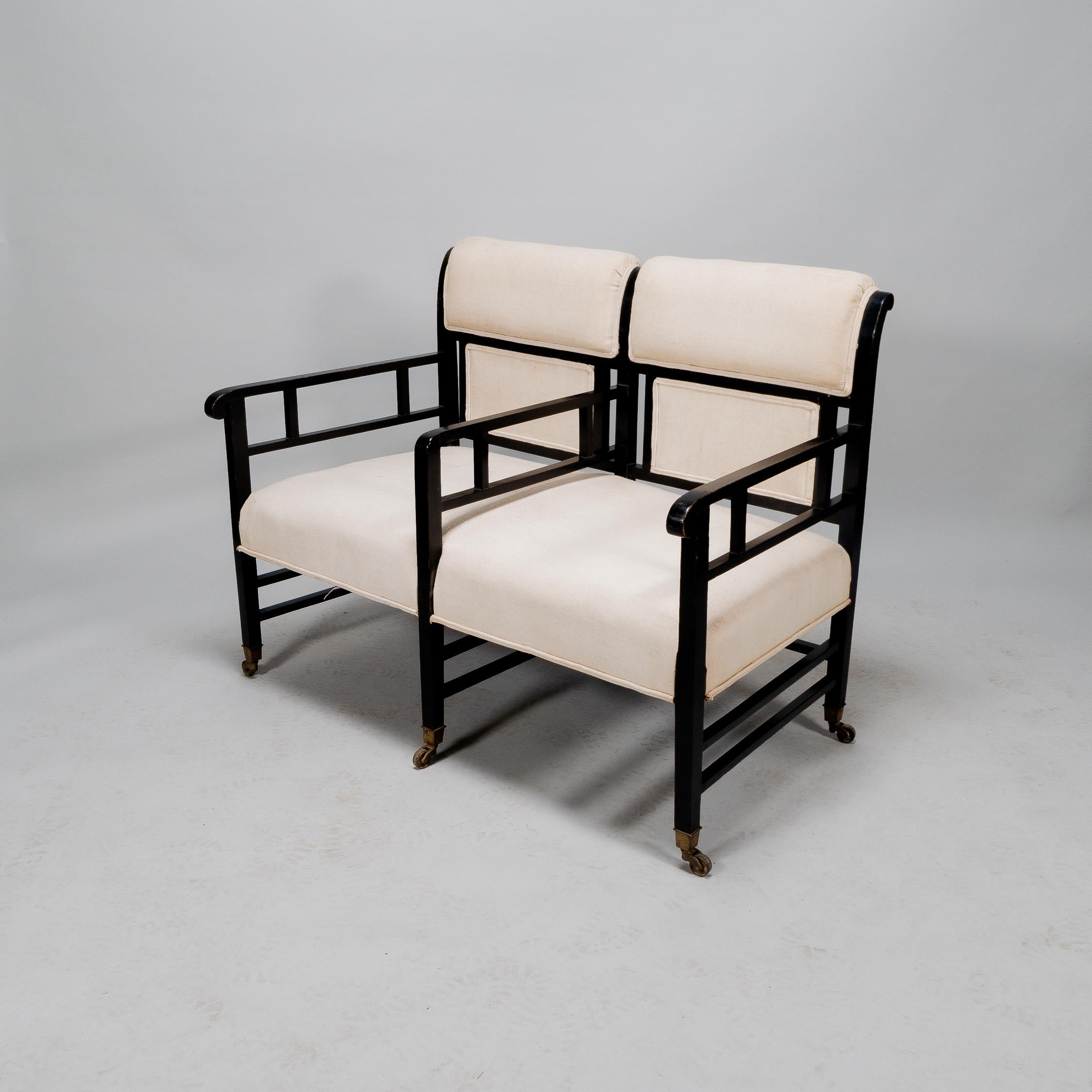 English E W Godwin (attributed). An Anglo-Japanese ebonized duet or conversation settee. For Sale