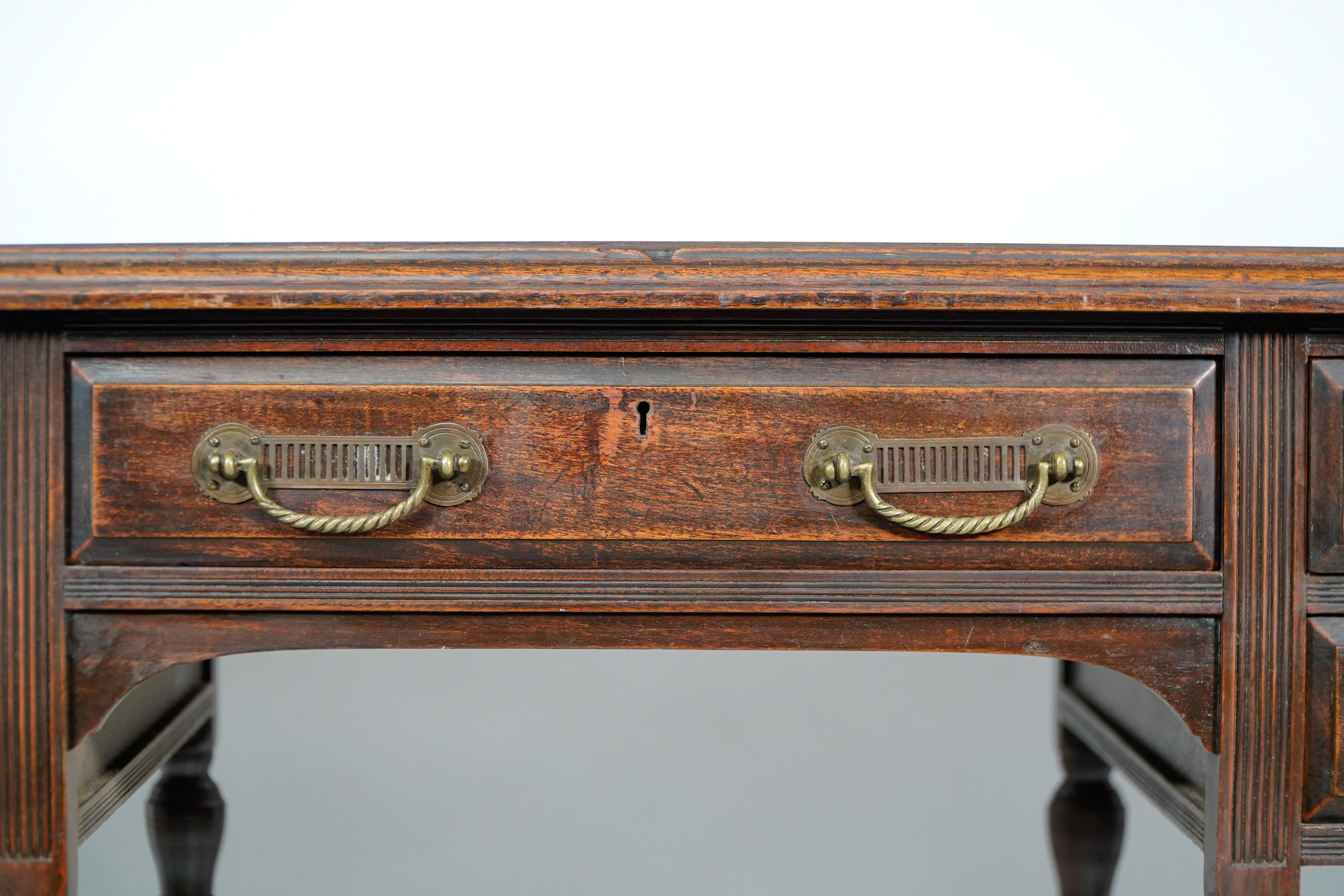 E W Godwin attr for Collinson & Lock. An Aesthetic Movement walnut writing table For Sale 4