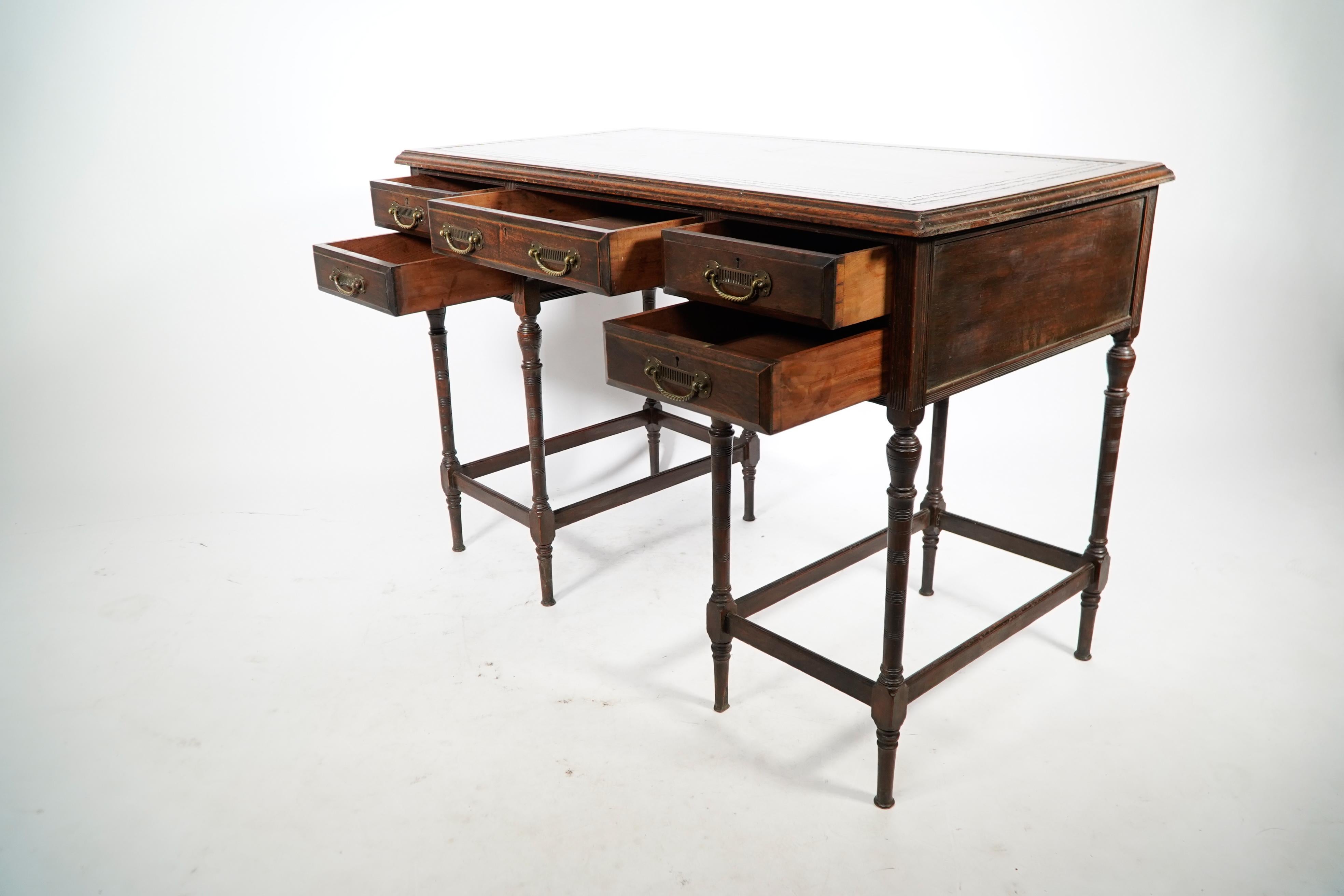Late 19th Century E W Godwin attr for Collinson & Lock. An Aesthetic Movement walnut writing table For Sale