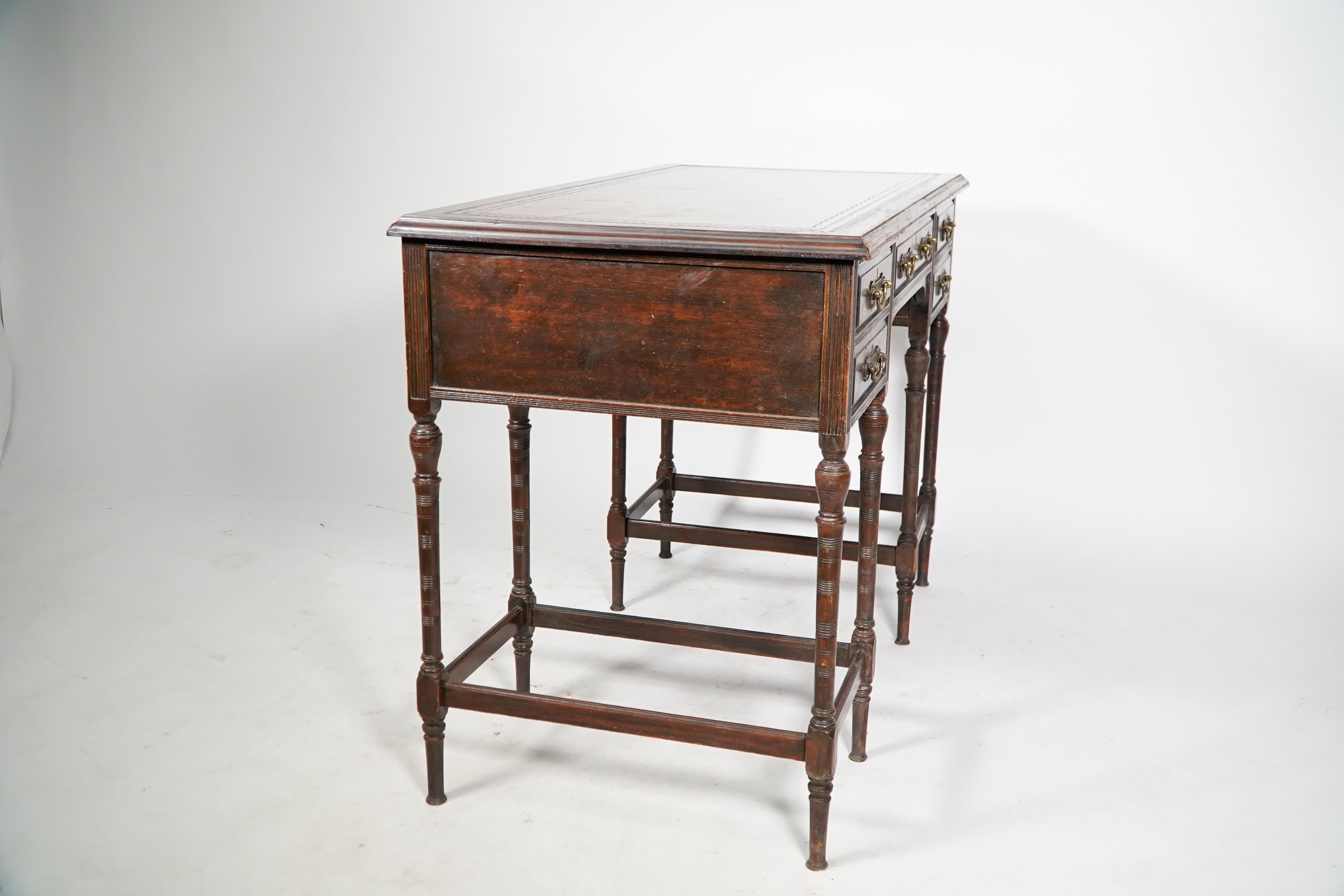 English E W Godwin attr for Collinson & Lock. An Aesthetic Movement walnut writing table For Sale