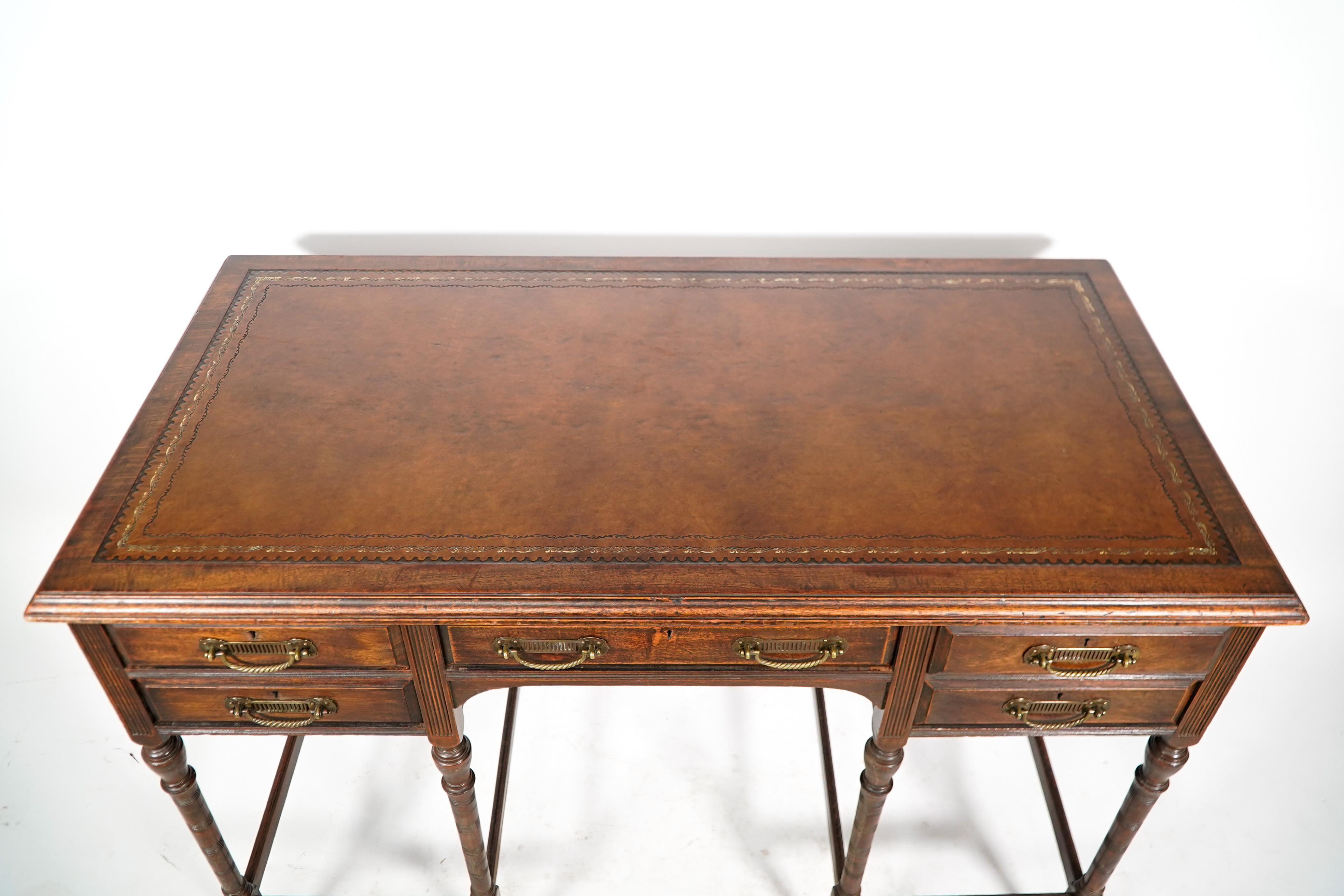 E W Godwin attr for Collinson & Lock. An Aesthetic Movement walnut writing table In Good Condition For Sale In London, GB