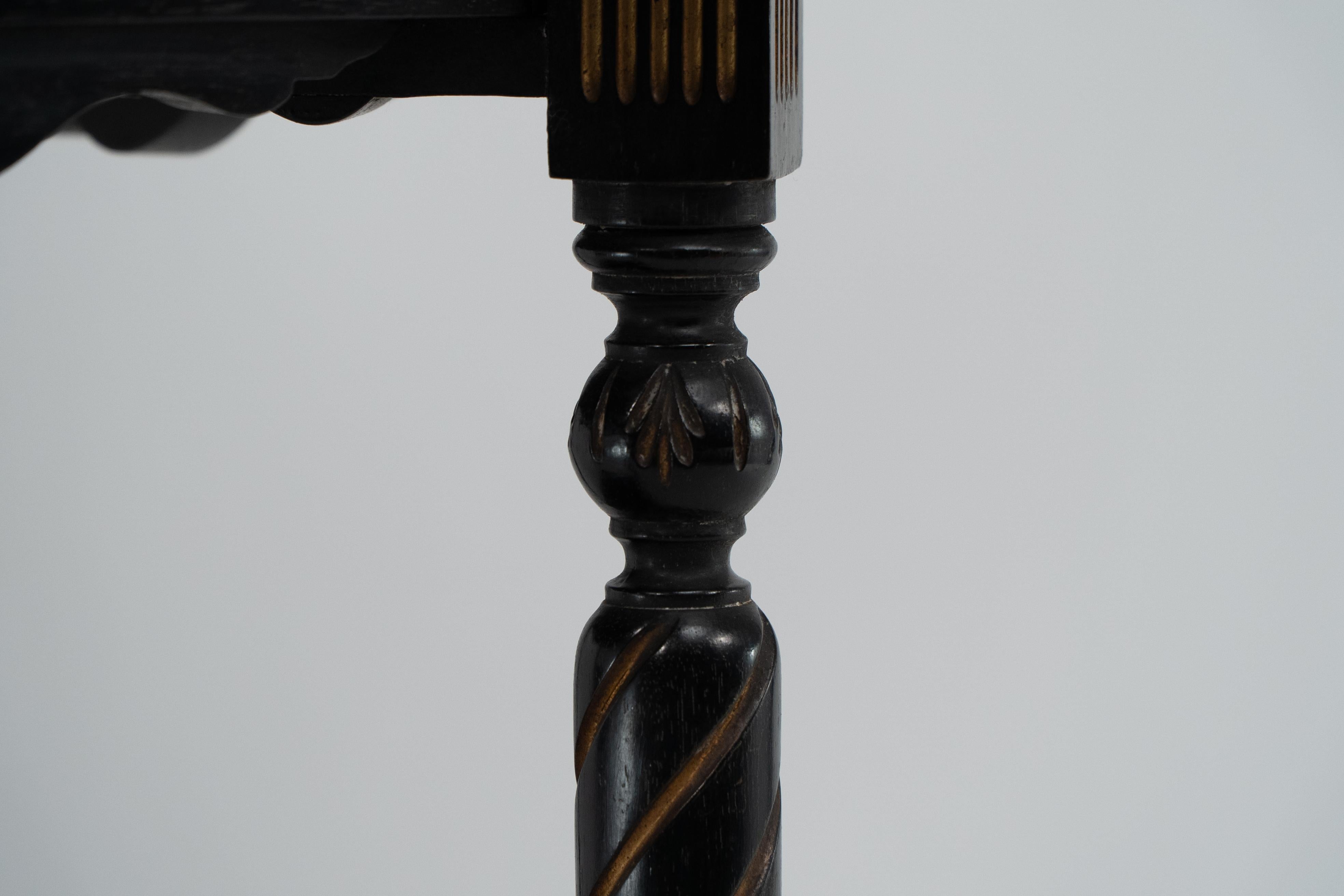 E W Godwin for Collinson & Lock An ebonised & parcel gilt side table chess table For Sale 4