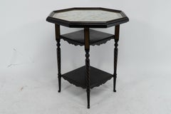 E W Godwin for Collinson & Lock An ebonised & parcel gilt side table chess table