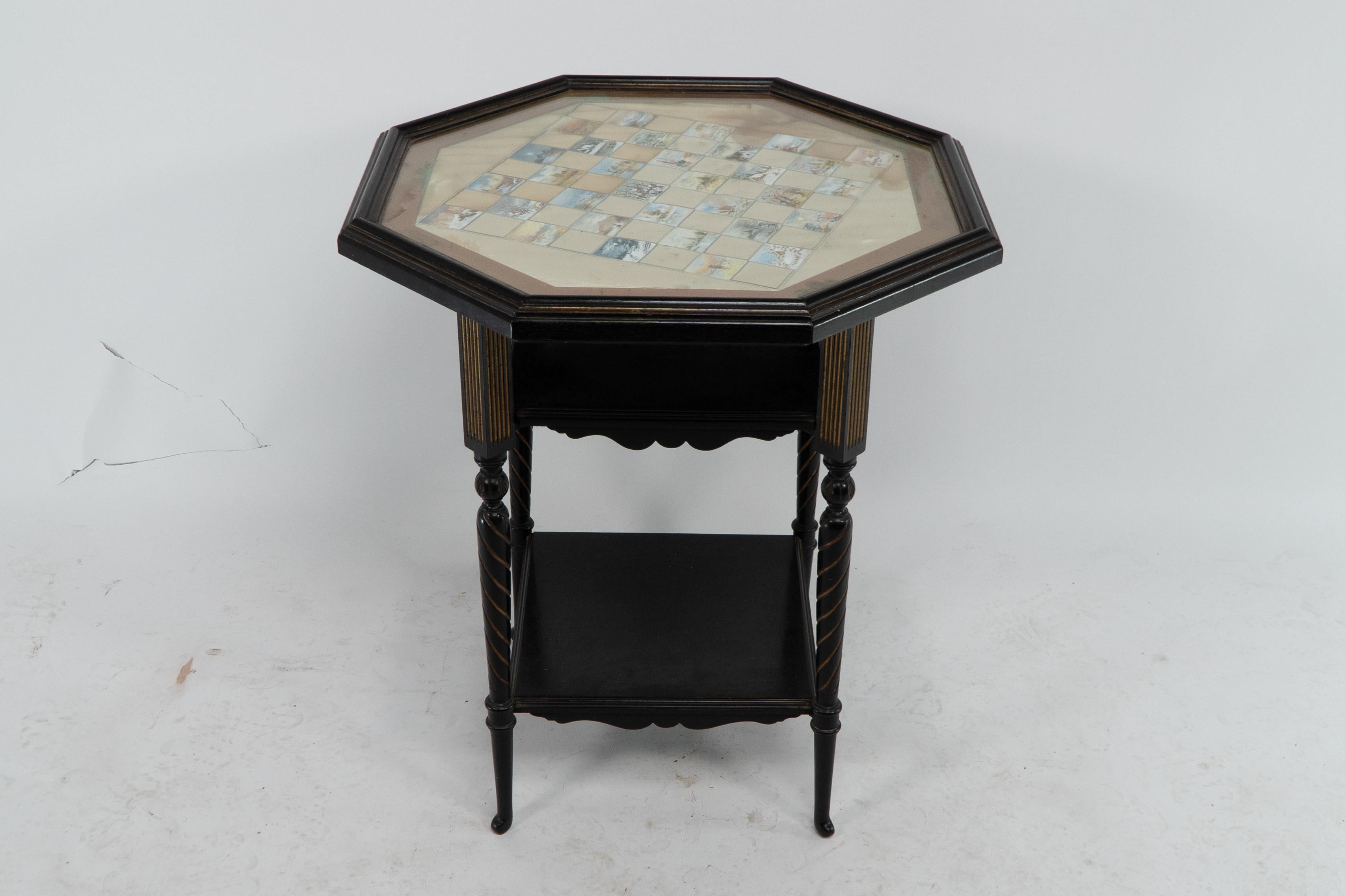 English E W Godwin for Collinson & Lock An ebonised & parcel gilt side table chess table For Sale