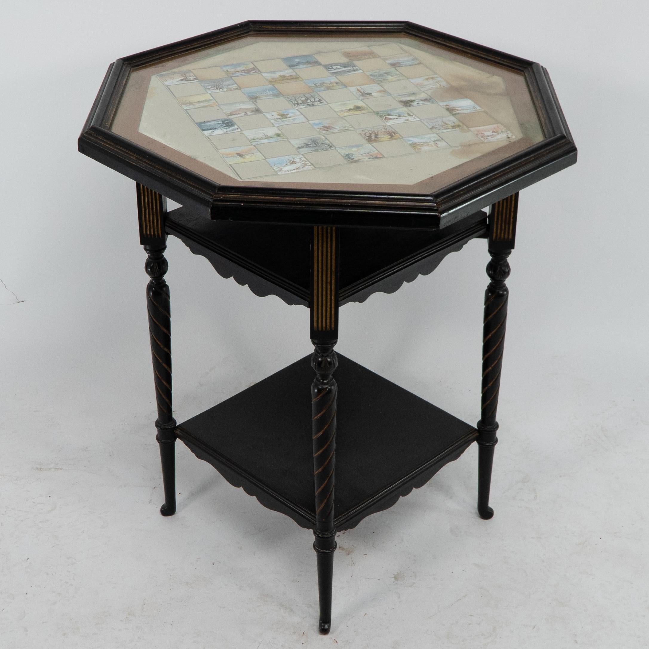 E W Godwin for Collinson & Lock An ebonised & parcel gilt side table chess table In Good Condition For Sale In London, GB
