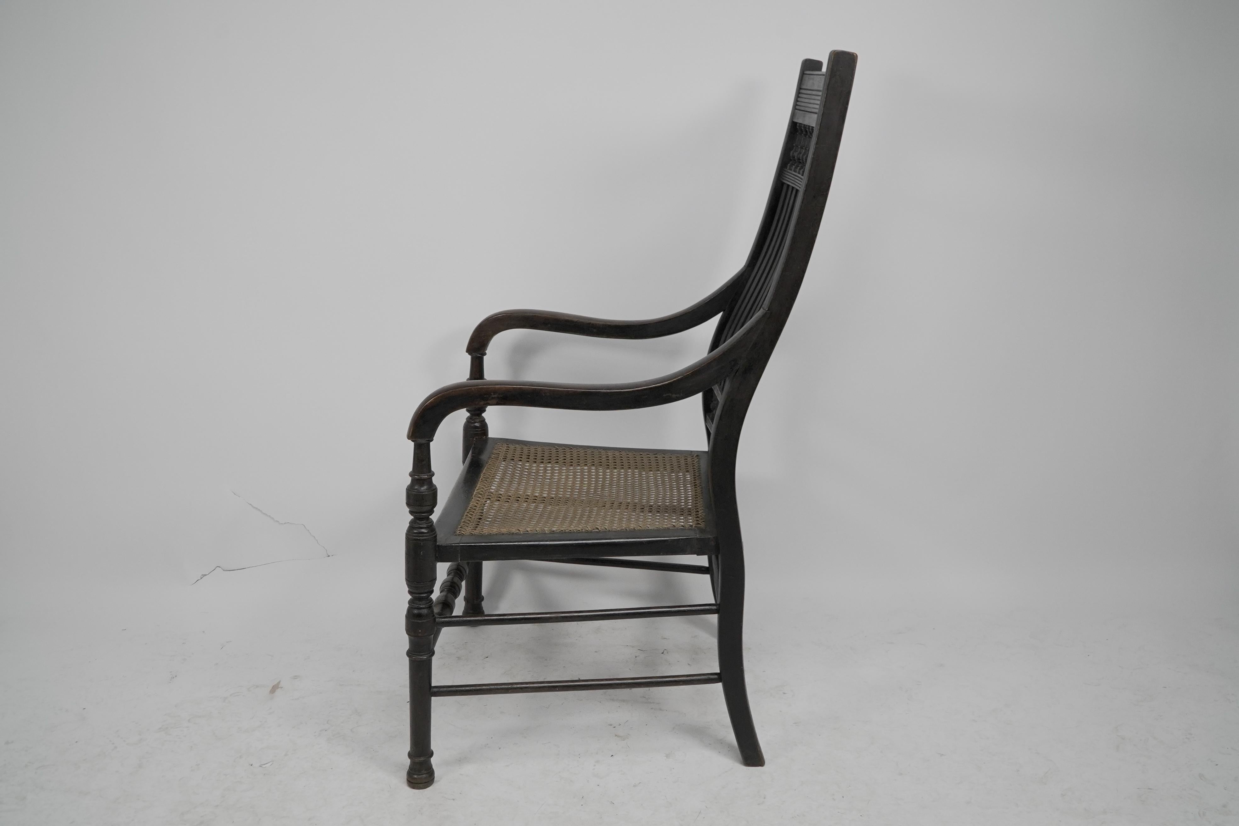 Ebonized E W Godwin for William Watt An Aesthetic Movement tall back ebonized armchair. For Sale