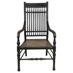 E W Godwin für William Watt Ein Aesthetic Movement Sessel mit hoher ebonisierter Rückenlehne.