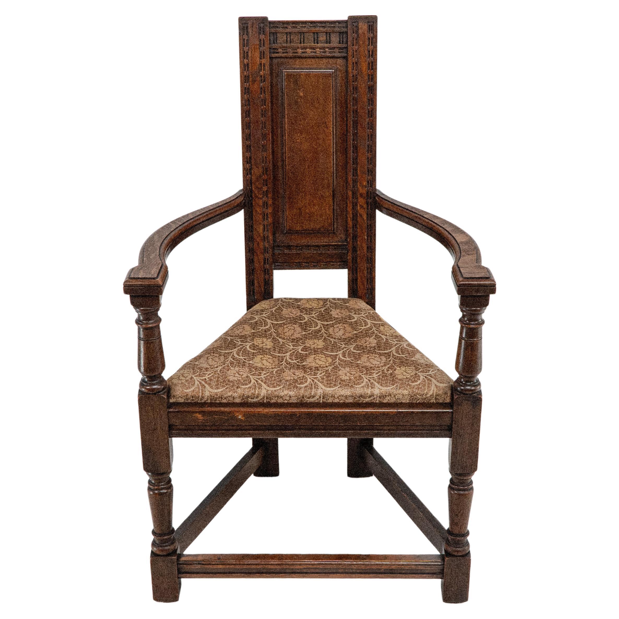 E W Godwin for William Watt. An oak Shakespeare armchair. One of only four known