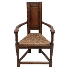 Antique E W Godwin for William Watt. An oak Shakespeare armchair. One of only four known