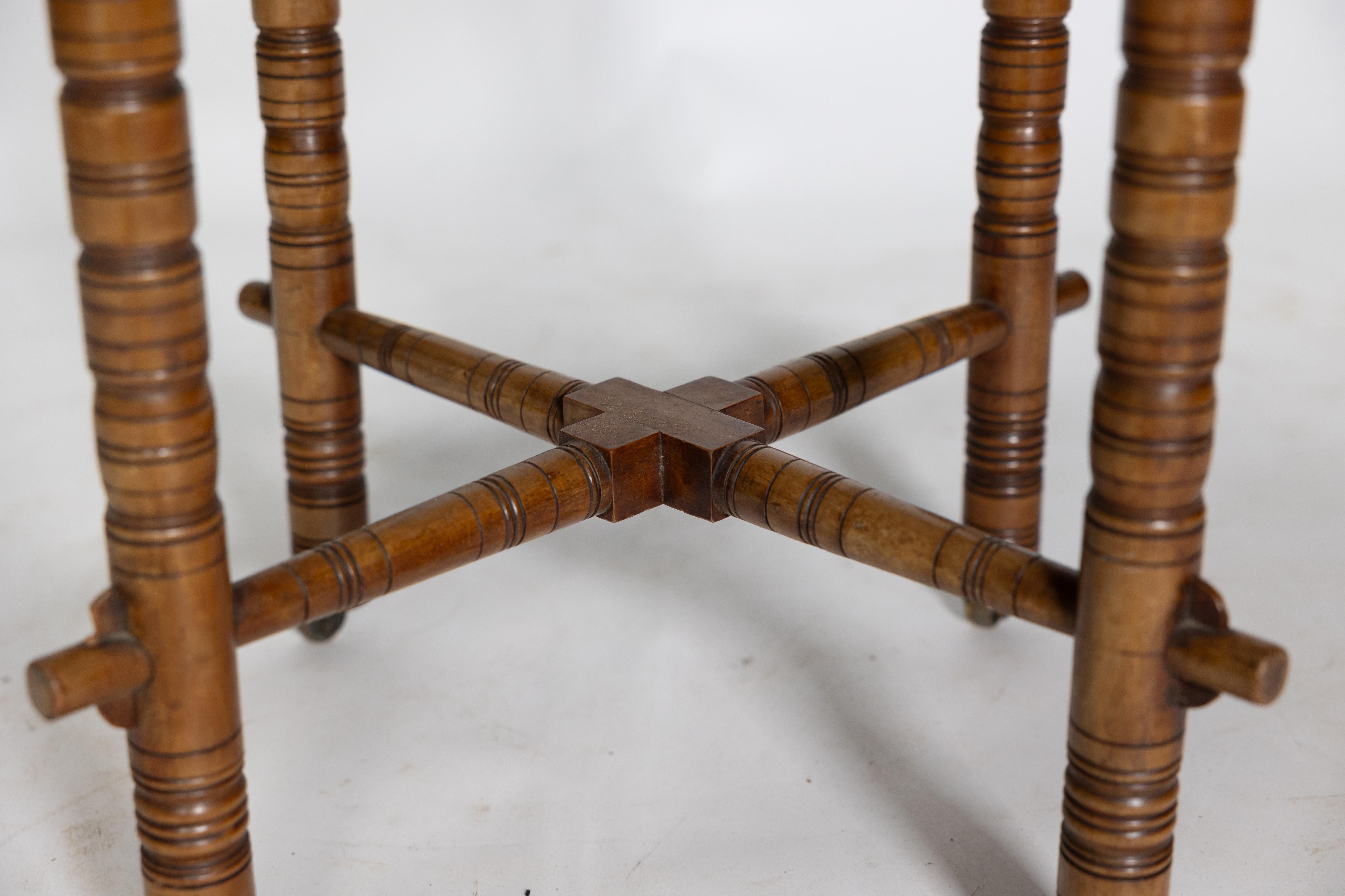 E W Godwin (style of). An Aesthetic Movement walnut octagonal table For Sale 7