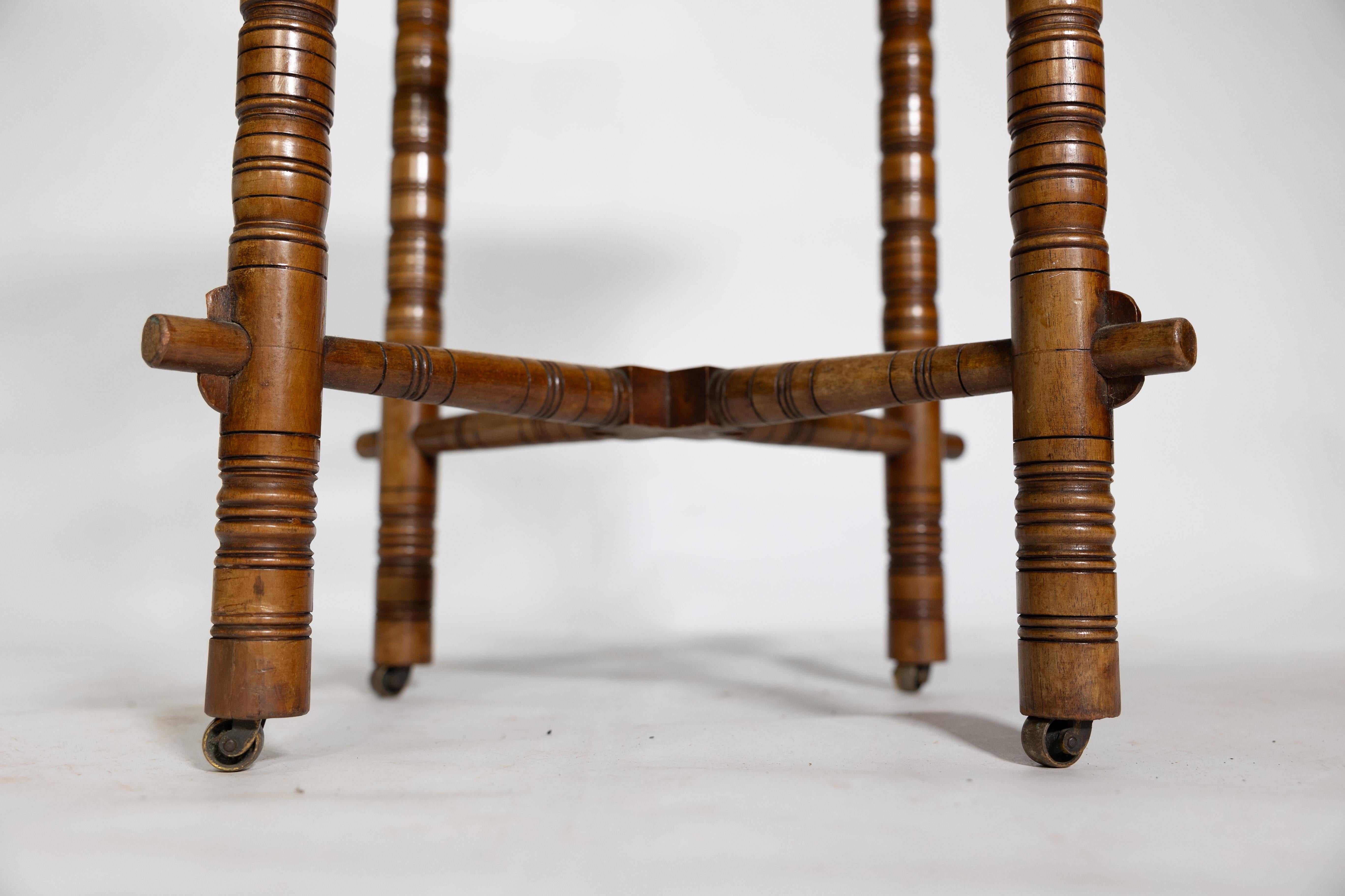 E W Godwin (style of). An Aesthetic Movement walnut octagonal table For Sale 9