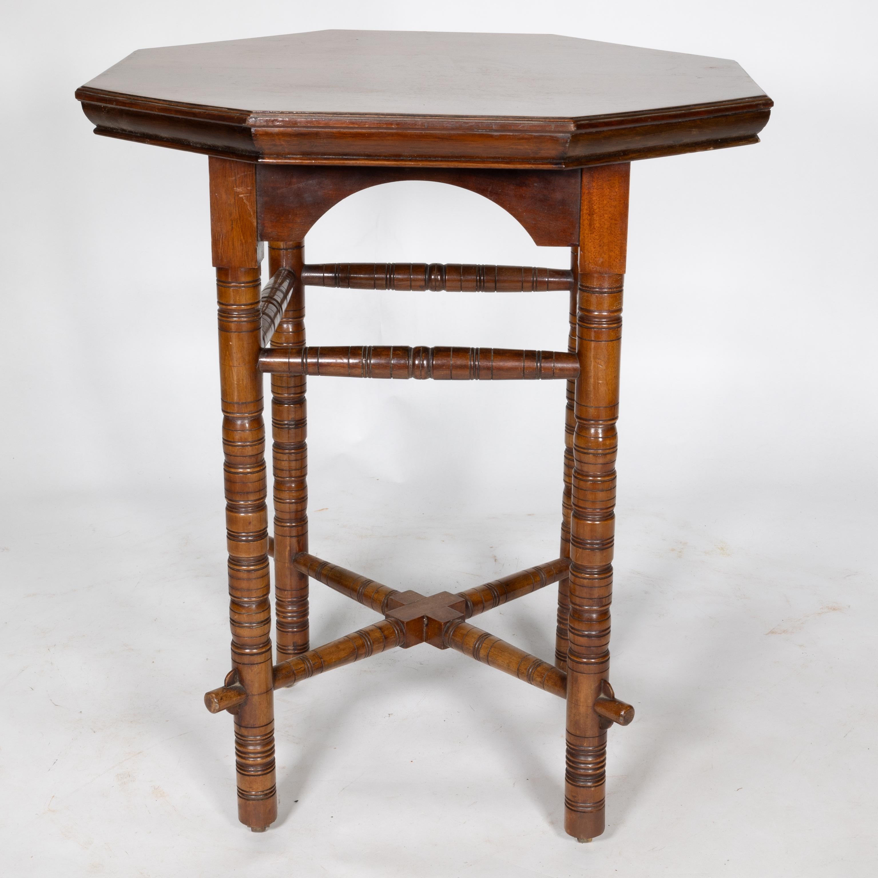 English E W Godwin (style of). An Aesthetic Movement walnut octagonal table For Sale