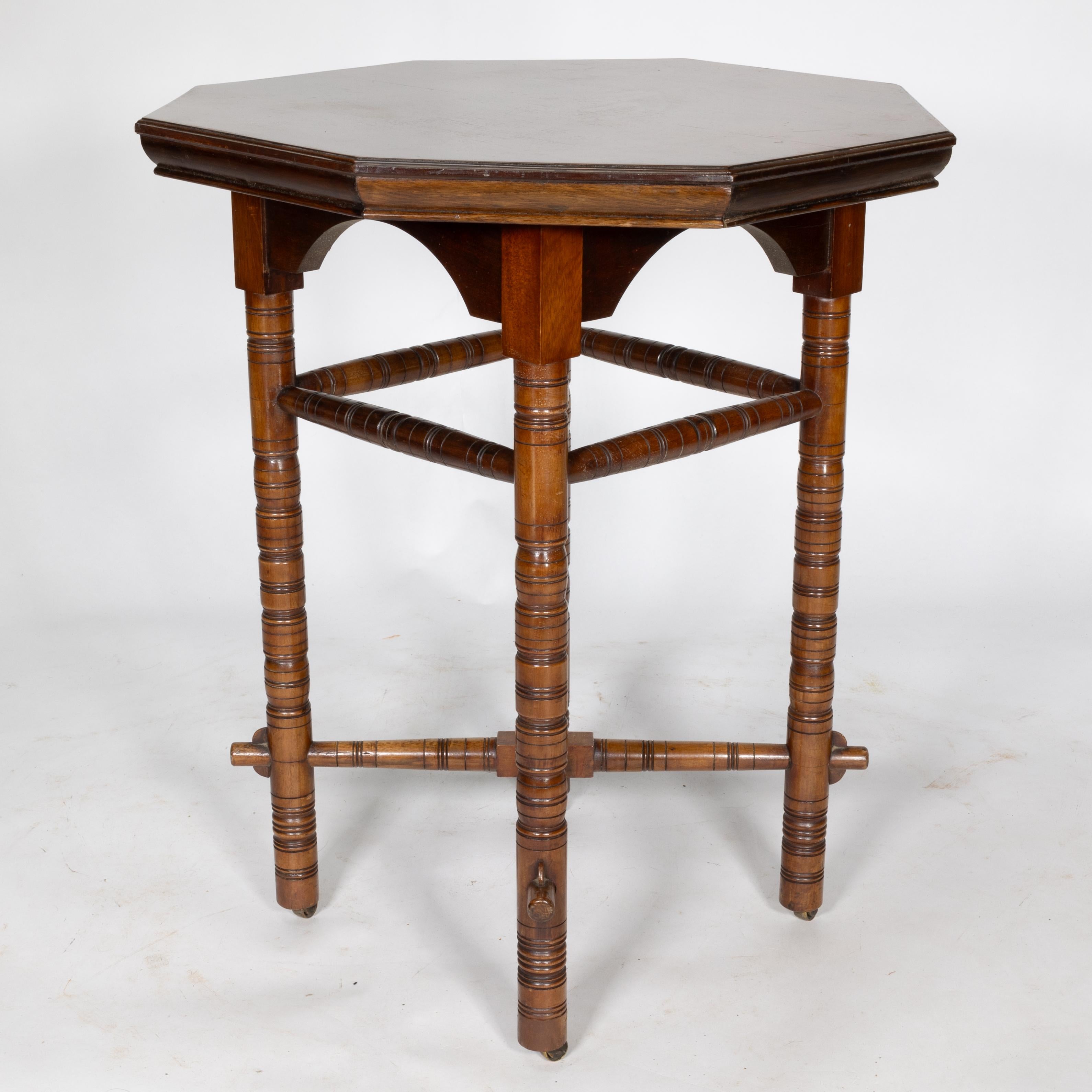 E W Godwin (style of). An Aesthetic Movement walnut octagonal table In Good Condition For Sale In London, GB