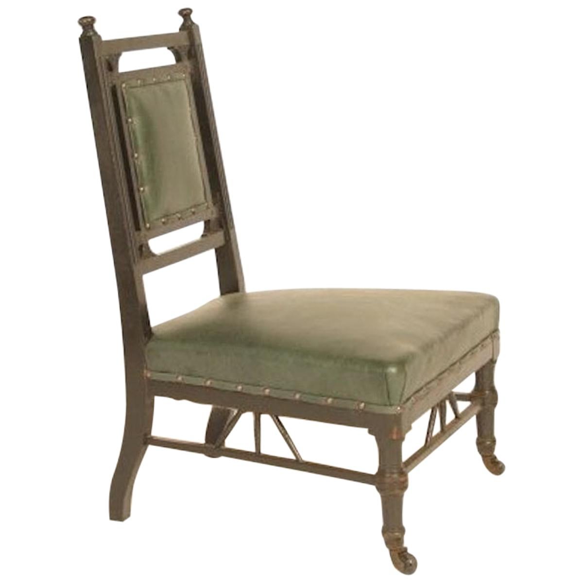 E W Godwin Style of, an Anglo-Japanese Nursing Chair with Subtle Carved Details