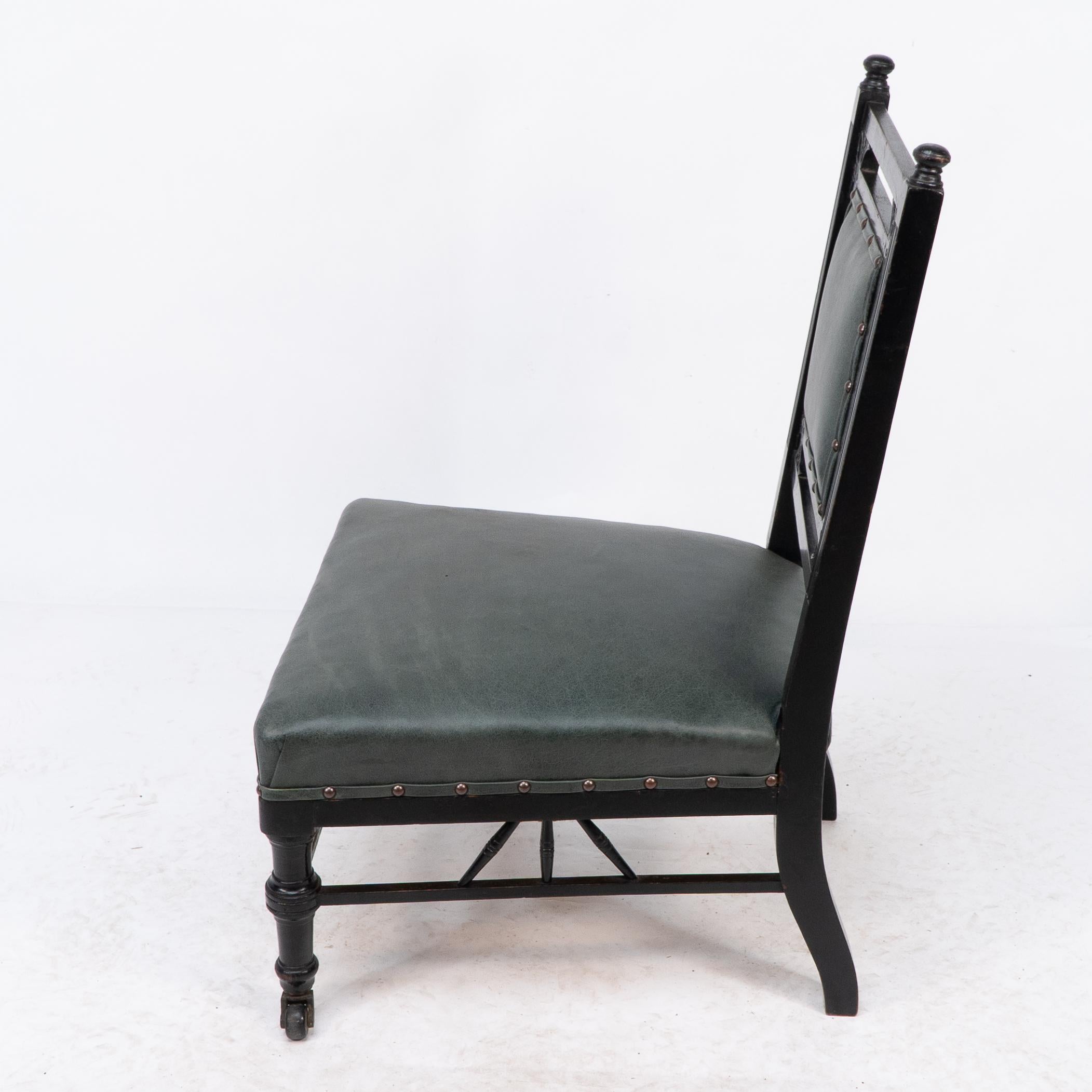 Ebonized E W Godwin style of. An Anglo-Japanese nursing chair with thebes style turnings For Sale