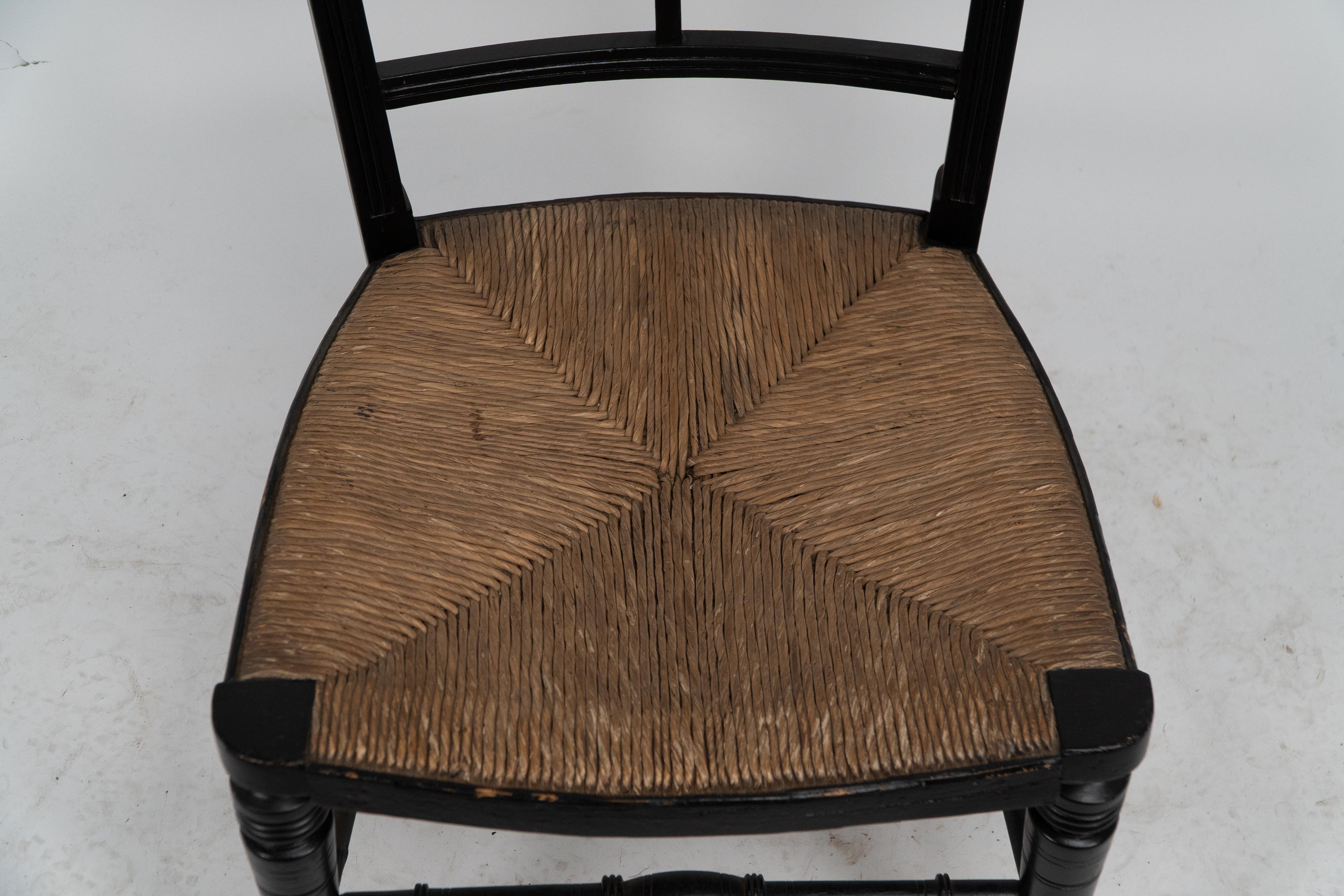 E W Godwin (style of). An Anglo-Japanese rush seat ebonized side chair For Sale 2