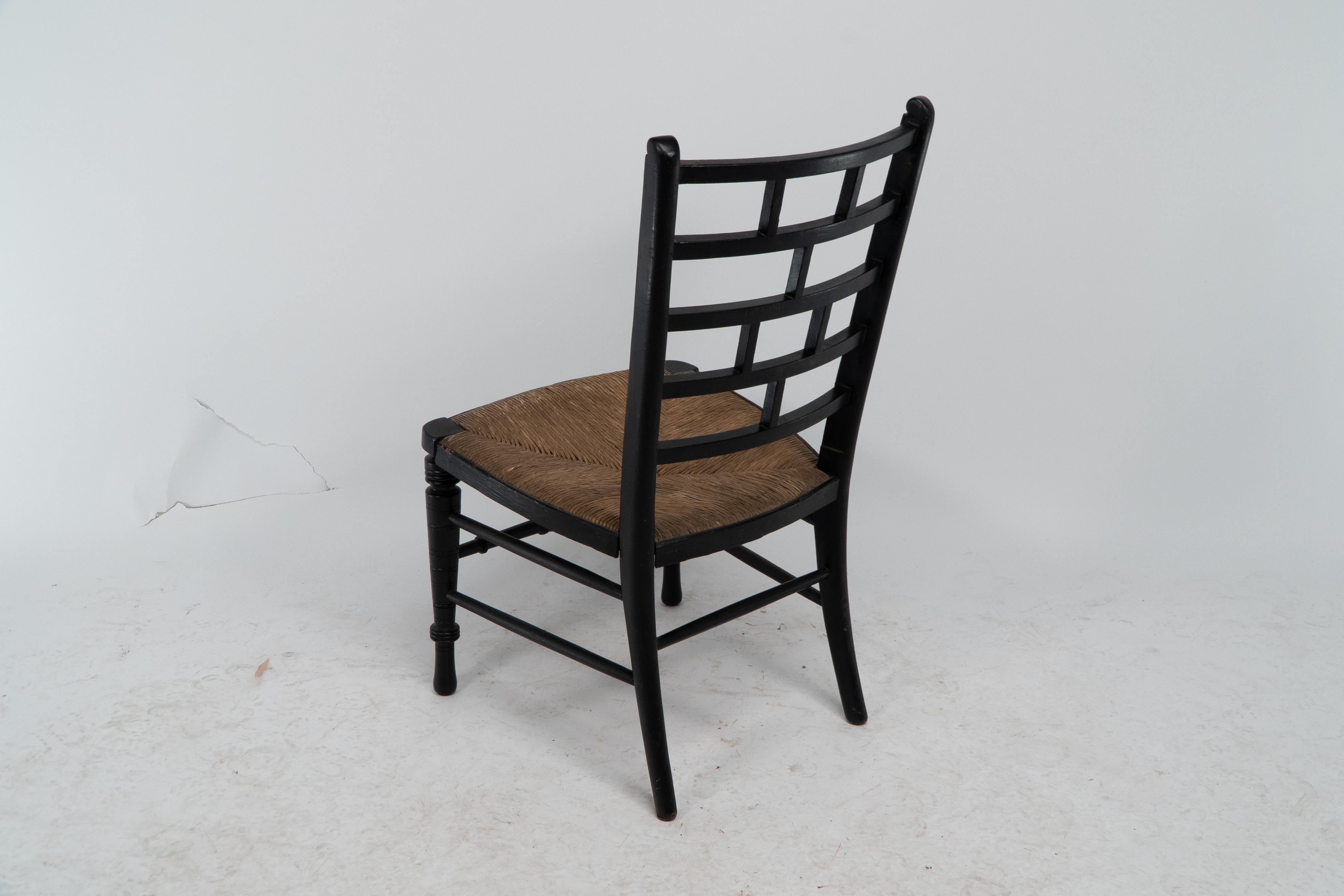 E W Godwin (style of). An Anglo-Japanese rush seat ebonized side chair For Sale 6