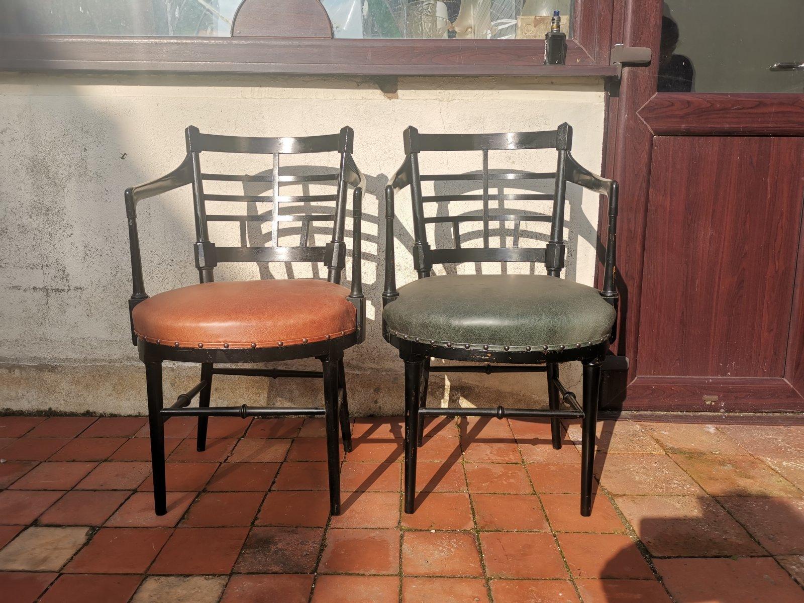 After a design by E W Godwin. Jacobean or Old English armchairs.
Two Aesthetic Movement Walnut ebonized armchairs both professionally reupholstered in a quality green and tan leather.
Probably made by Collier and Plunkett or James Peddle. See