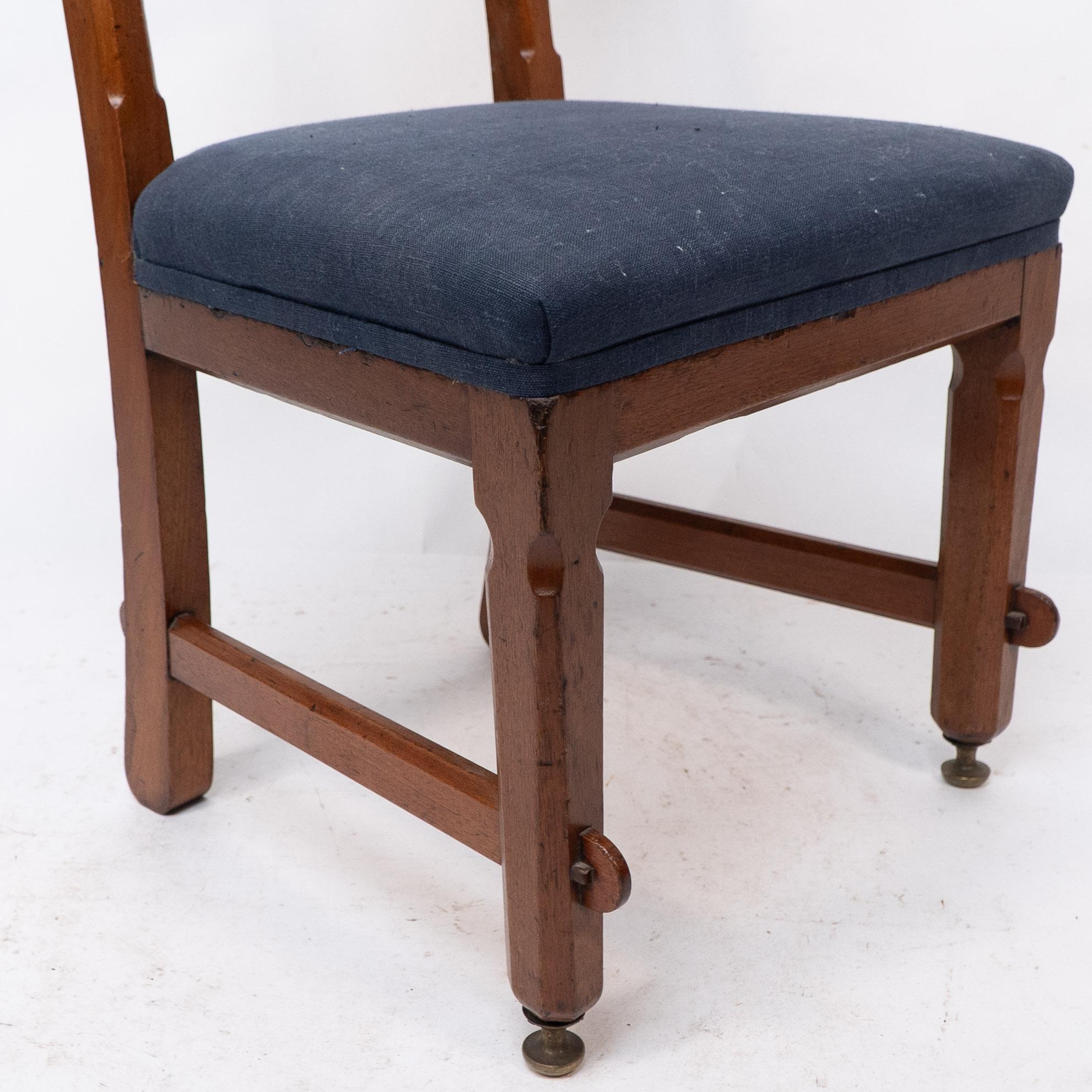 E W Pugin. A walnut side chair with curvaceous back rest with oak pegs For Sale 1