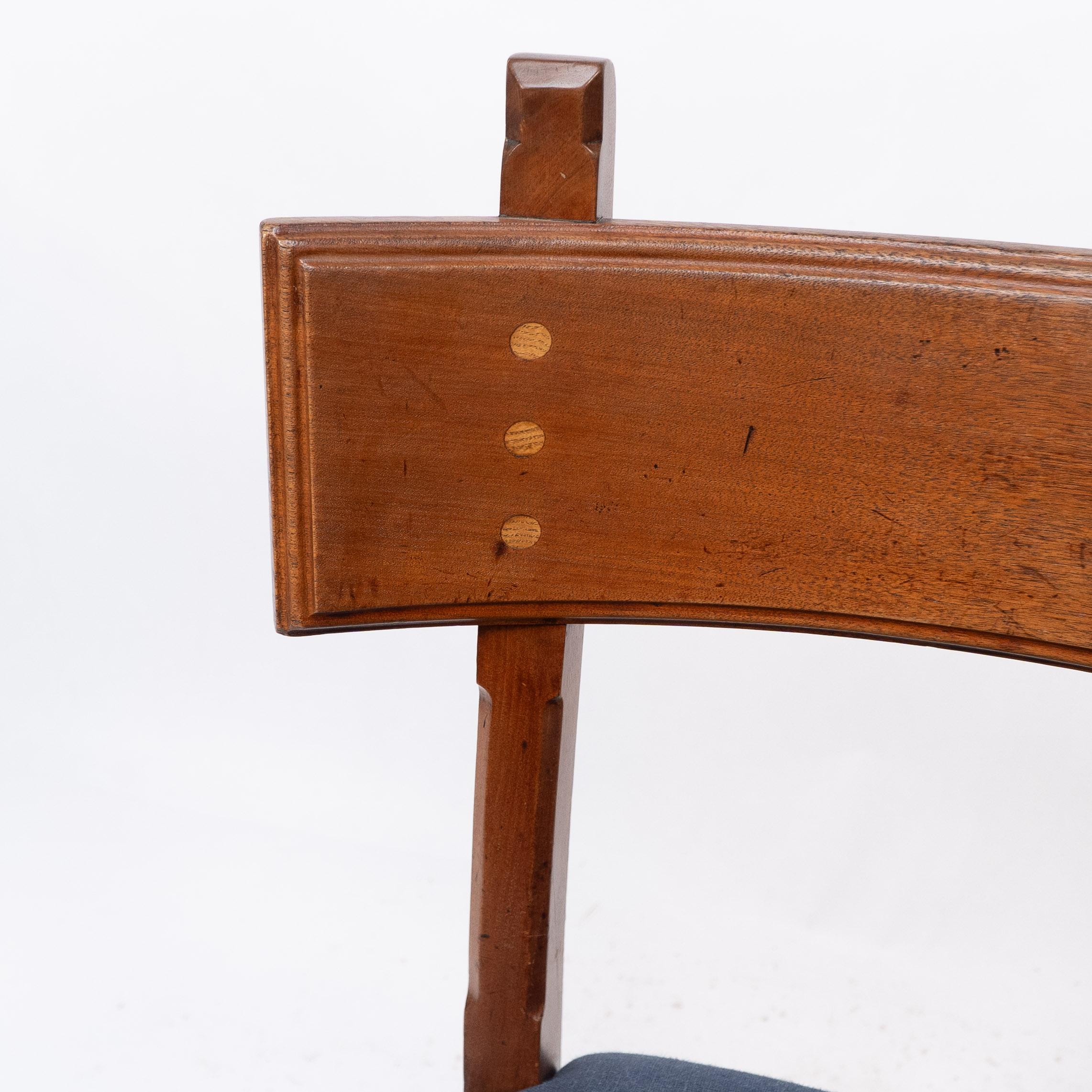English E W Pugin. A walnut side chair with curvaceous back rest with oak pegs For Sale