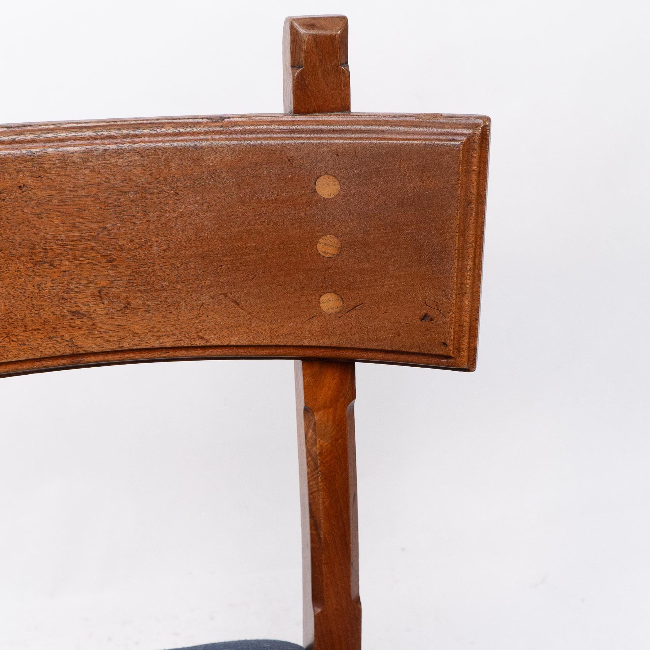 Walnut E W Pugin. A walnut side chair with curvaceous back rest with oak pegs For Sale