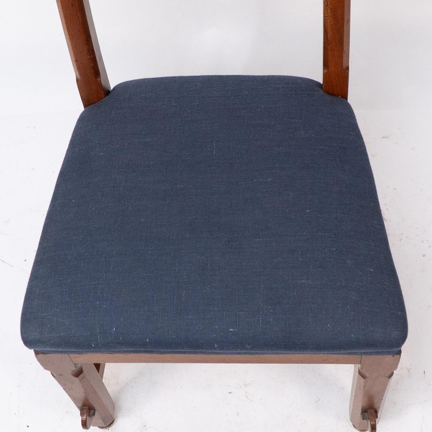 E W Pugin. A walnut side chair with curvaceous back rest with oak pegs For Sale 1