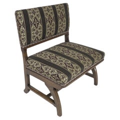 E W Pugin attri. A Gothic Revival oak duet chair with a wider than usual seat.