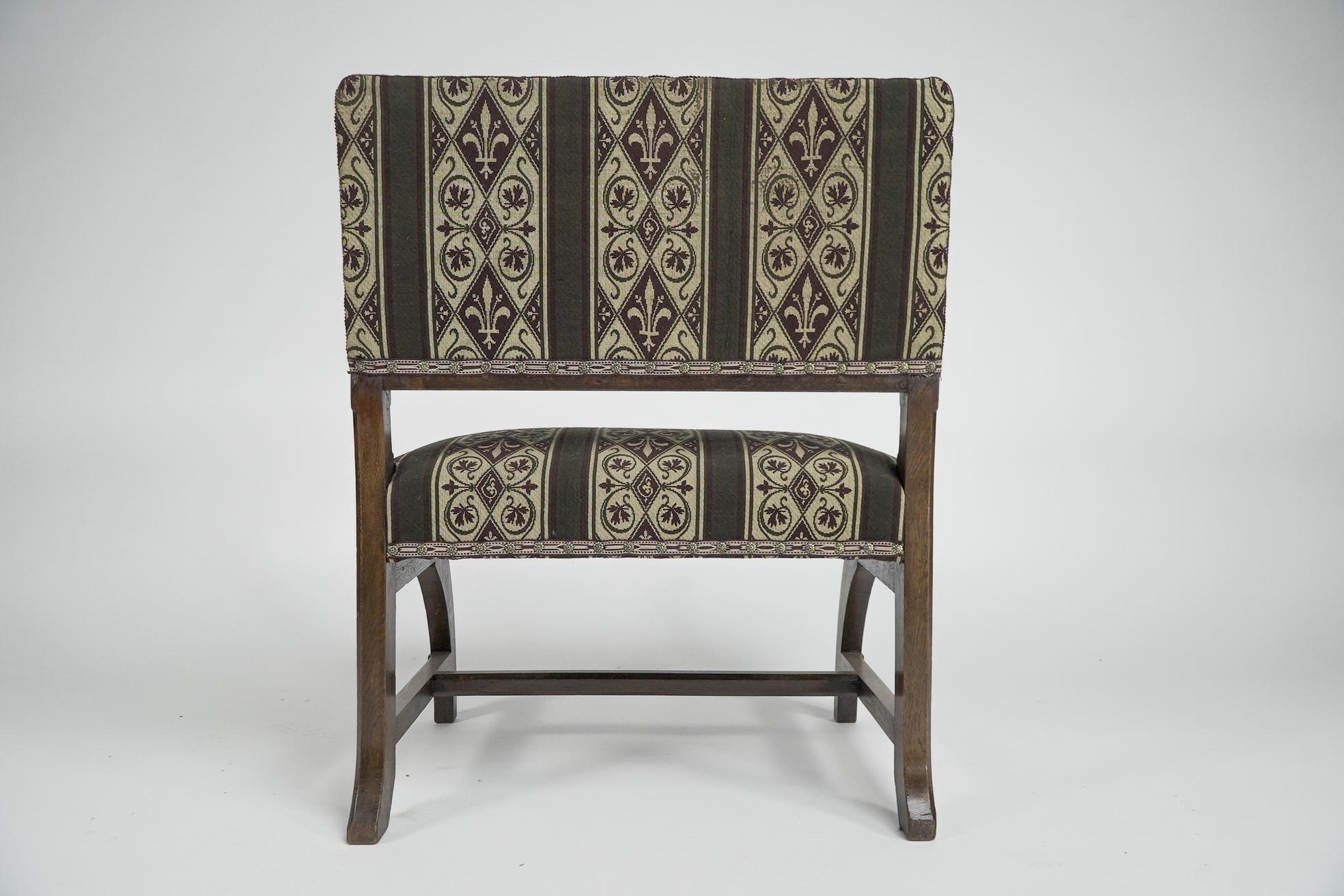 Oak E W Pugin attri. A Gothic Revival oak duet chair with a wider than usual seat. For Sale