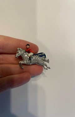 E Wolfe and Company handmade Platinum Horse and Rider Brooch