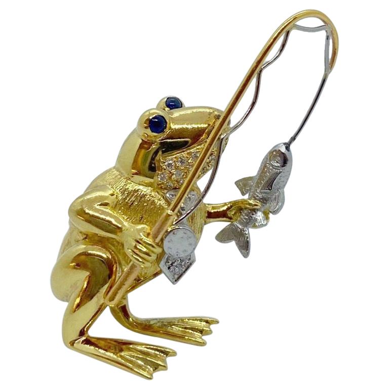 E. Wolfe & Co. 18 Karat Yellow and White Gold Frog with a Fishing Pole Brooch For Sale