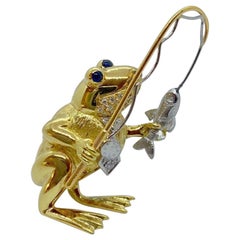 E. Wolfe & Co. 18 Karat Yellow and White Gold Frog with a Fishing Pole Brooch