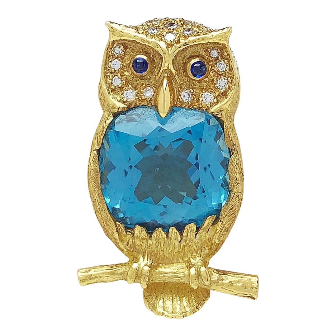 E. Wolfe & Co. 18 Karat Yellow Gold and 17.86 Carat Blue Topaz Owl Brooch