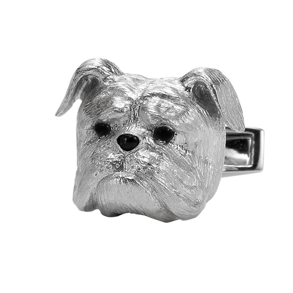 18 karat white gold bulldog cufflinks. The beautifully sculpted bulldogs face is in a brushed white gold. The eyes are set with blue sapphire cabochons and the nose is black onyx. Bar with hinged lever back.
Stamped EW&CO 750 jewelers hallmark
