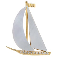 E Wolfe & Company 18 Carat Yellow Gold and Mother of Pearl Sailing Boat Brooch