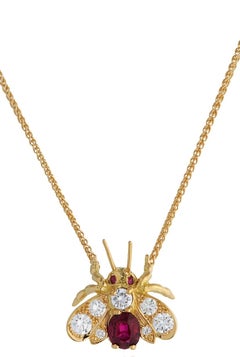 Ciondolo con diamante e rubino in oro giallo 18 ct.