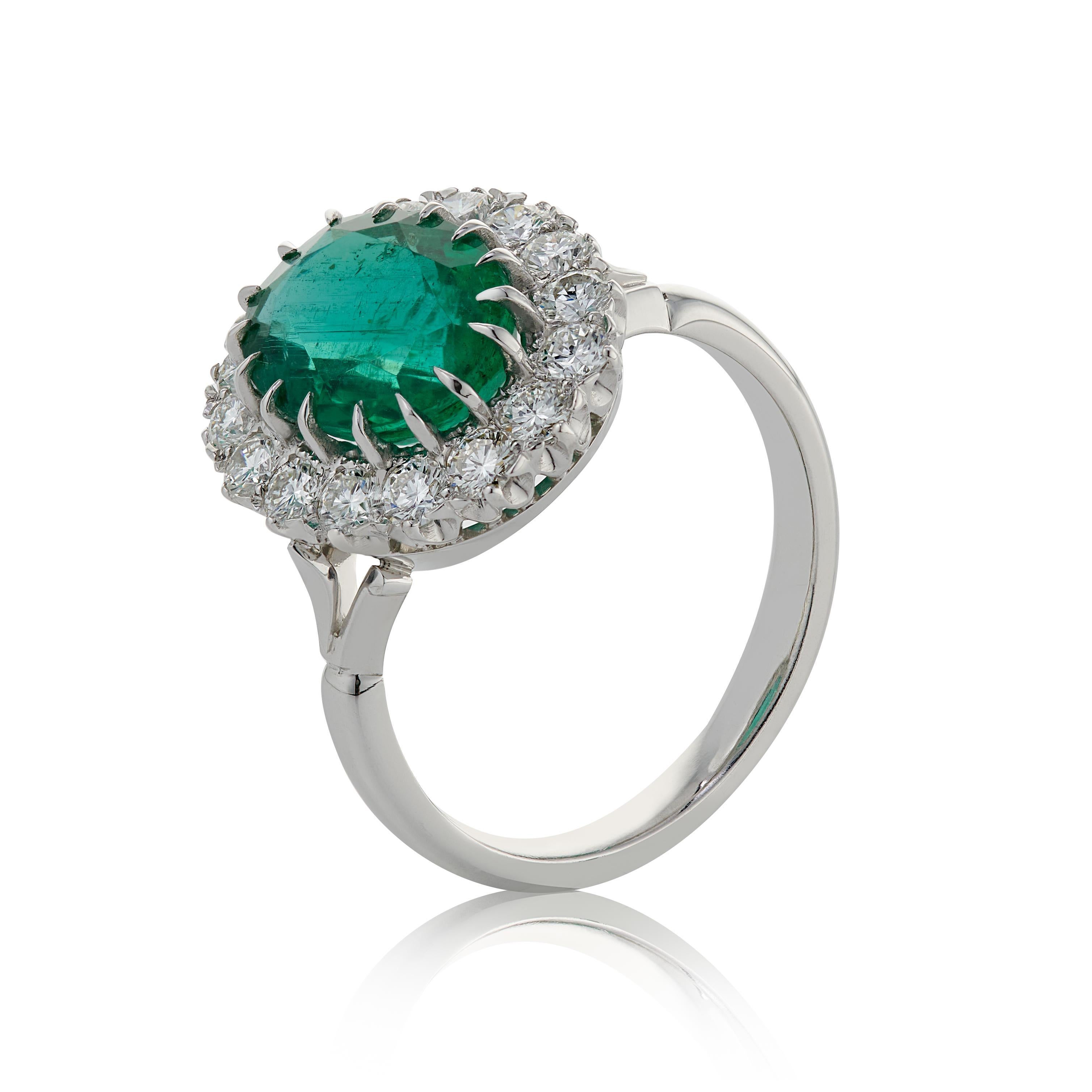 Contemporary 2.82 Carat Emerald and Diamond Platinum Cluster Ring For Sale